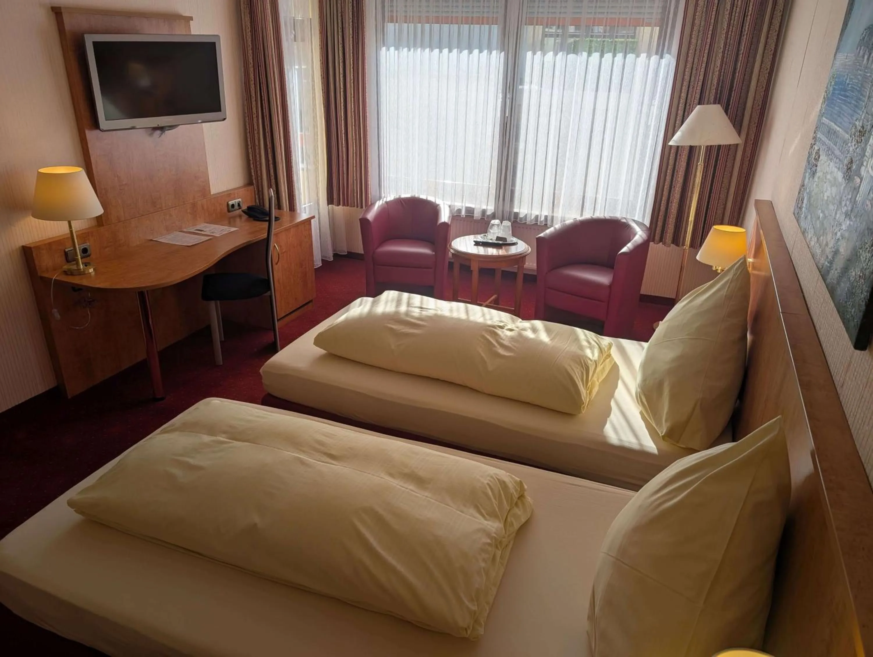 Bed in Stadthotel Augsburg