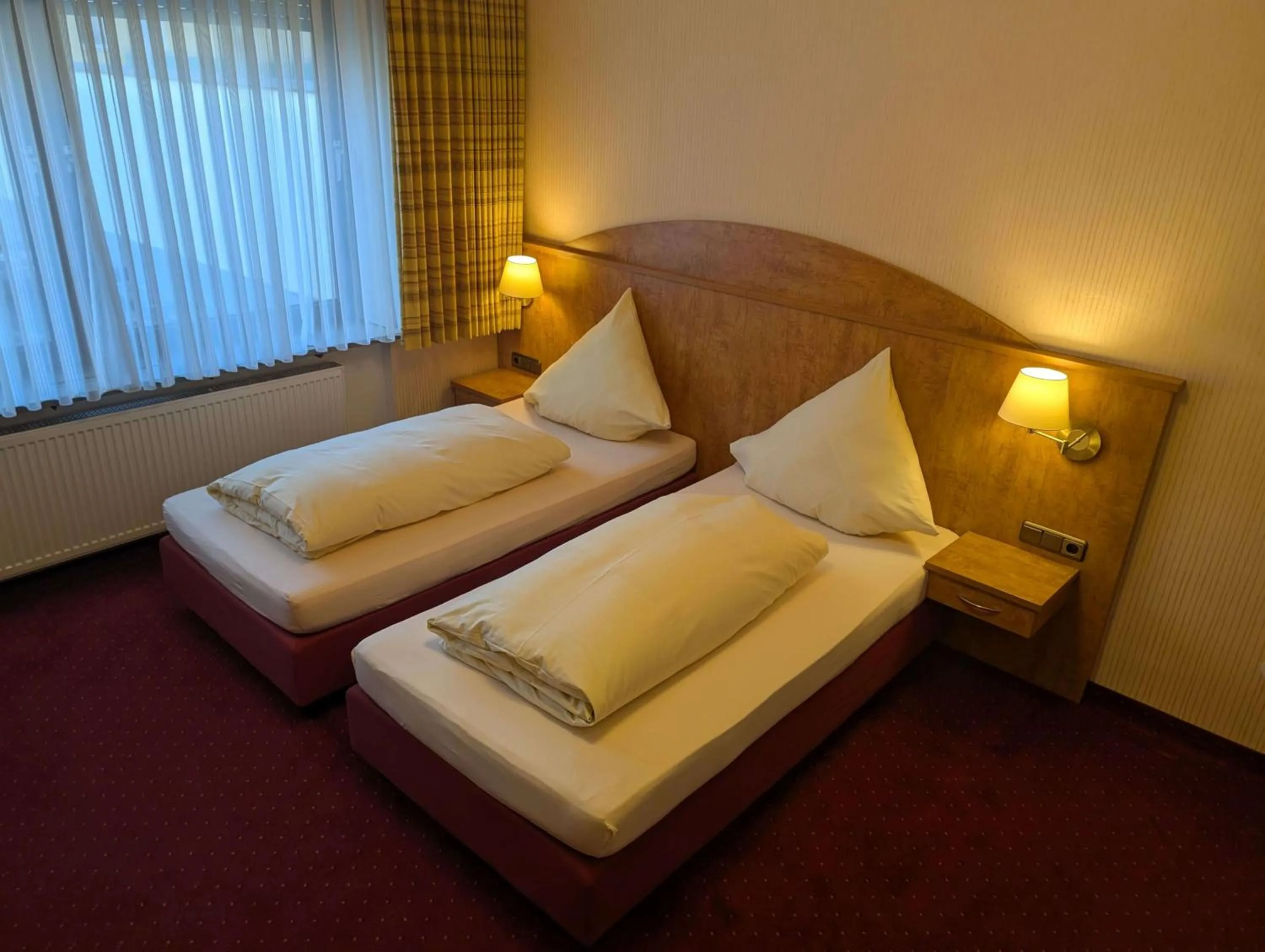 Bed in Stadthotel Augsburg