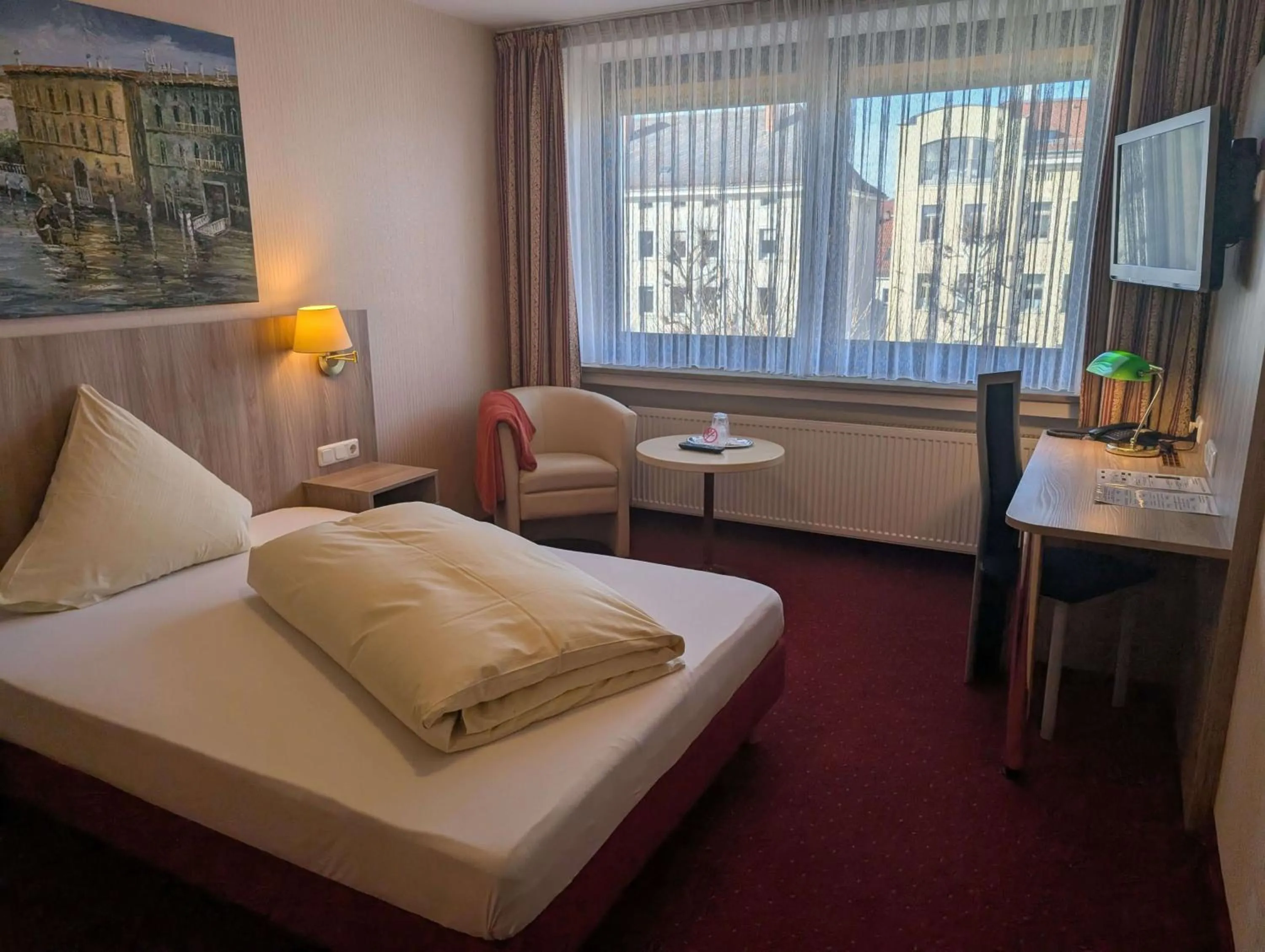 Bed in Stadthotel Augsburg