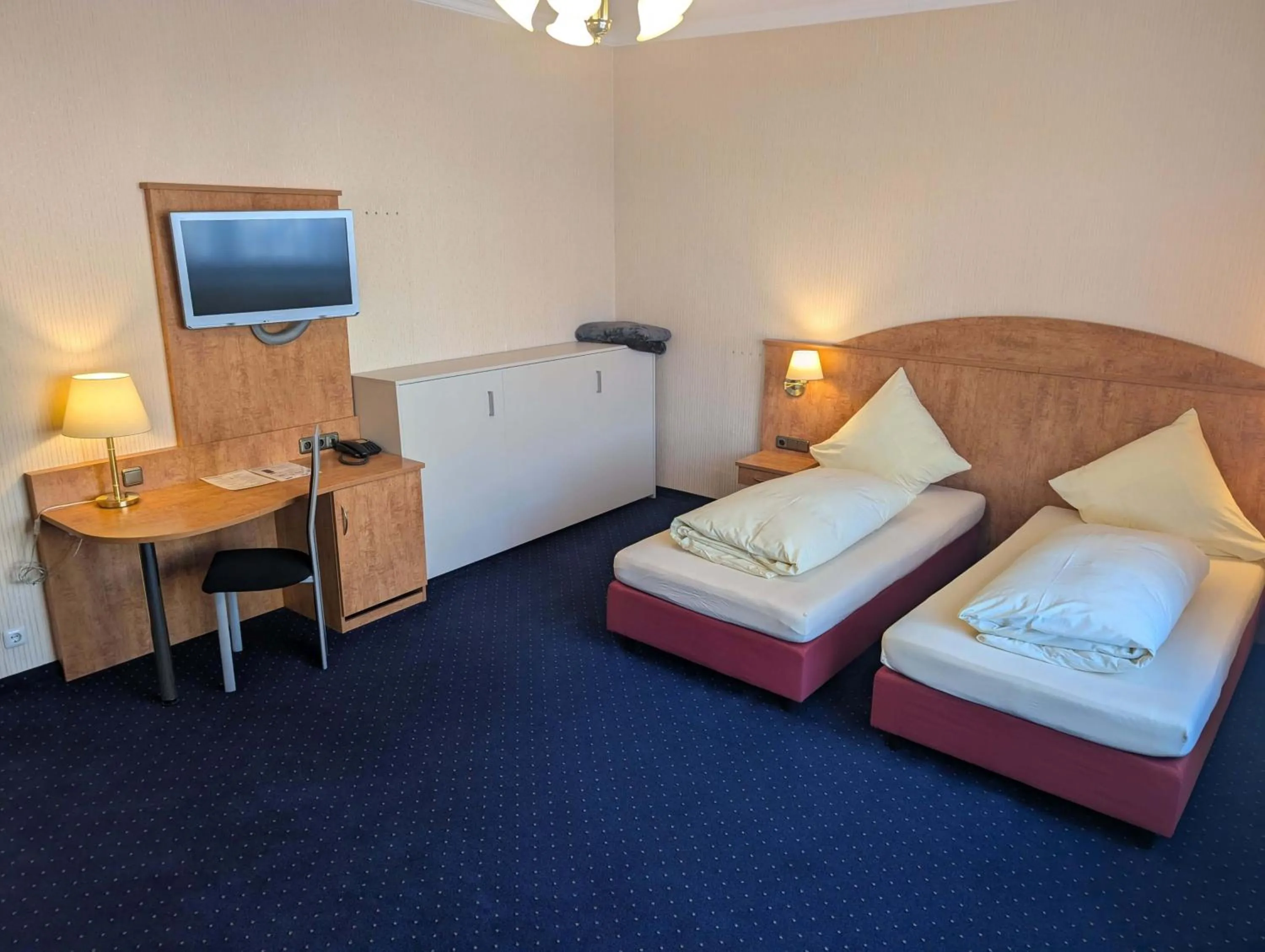 Bed in Stadthotel Augsburg