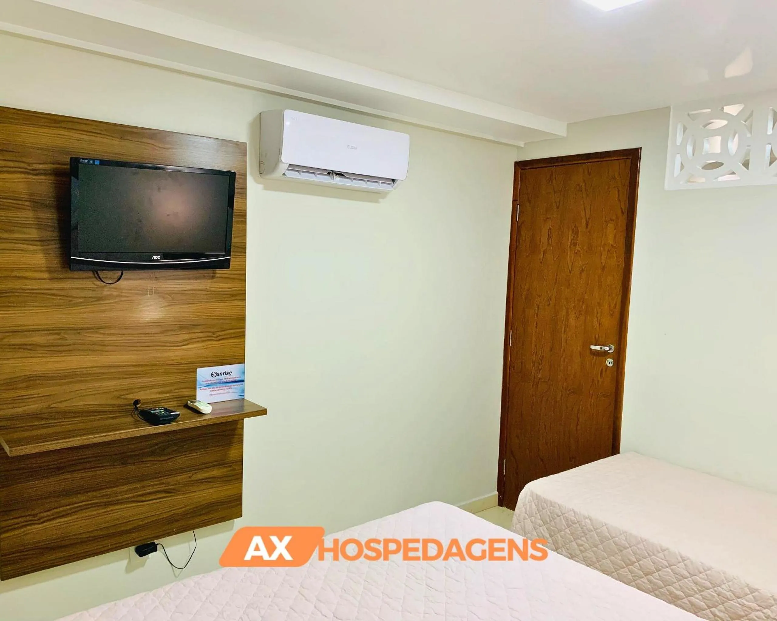 Bed in AX Blue Suítes