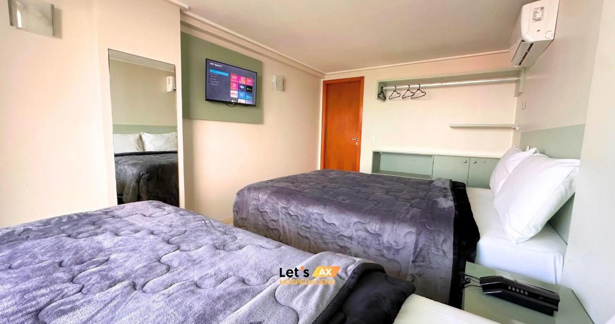 Bed in AX Blue Suítes