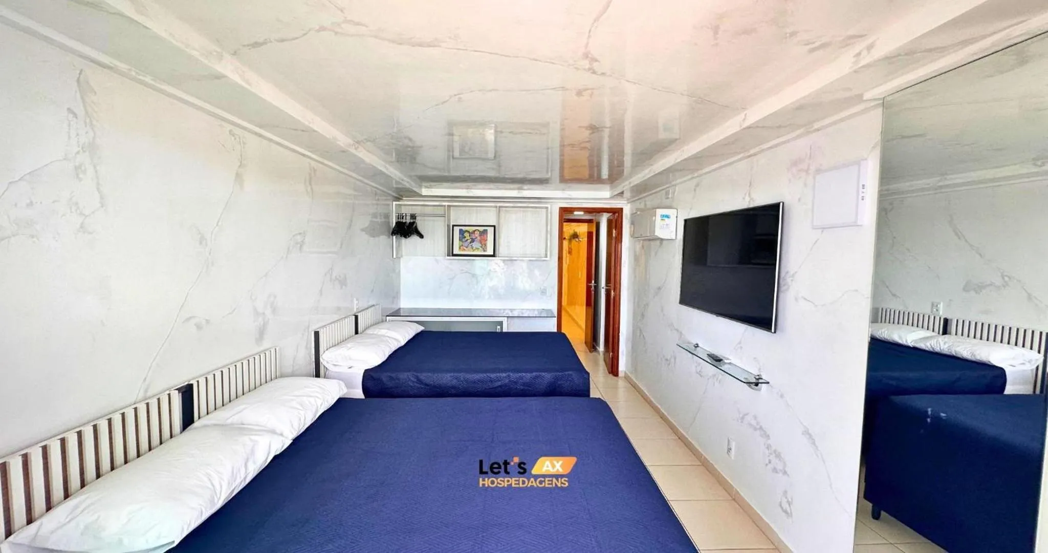 Bed in AX Blue Suítes