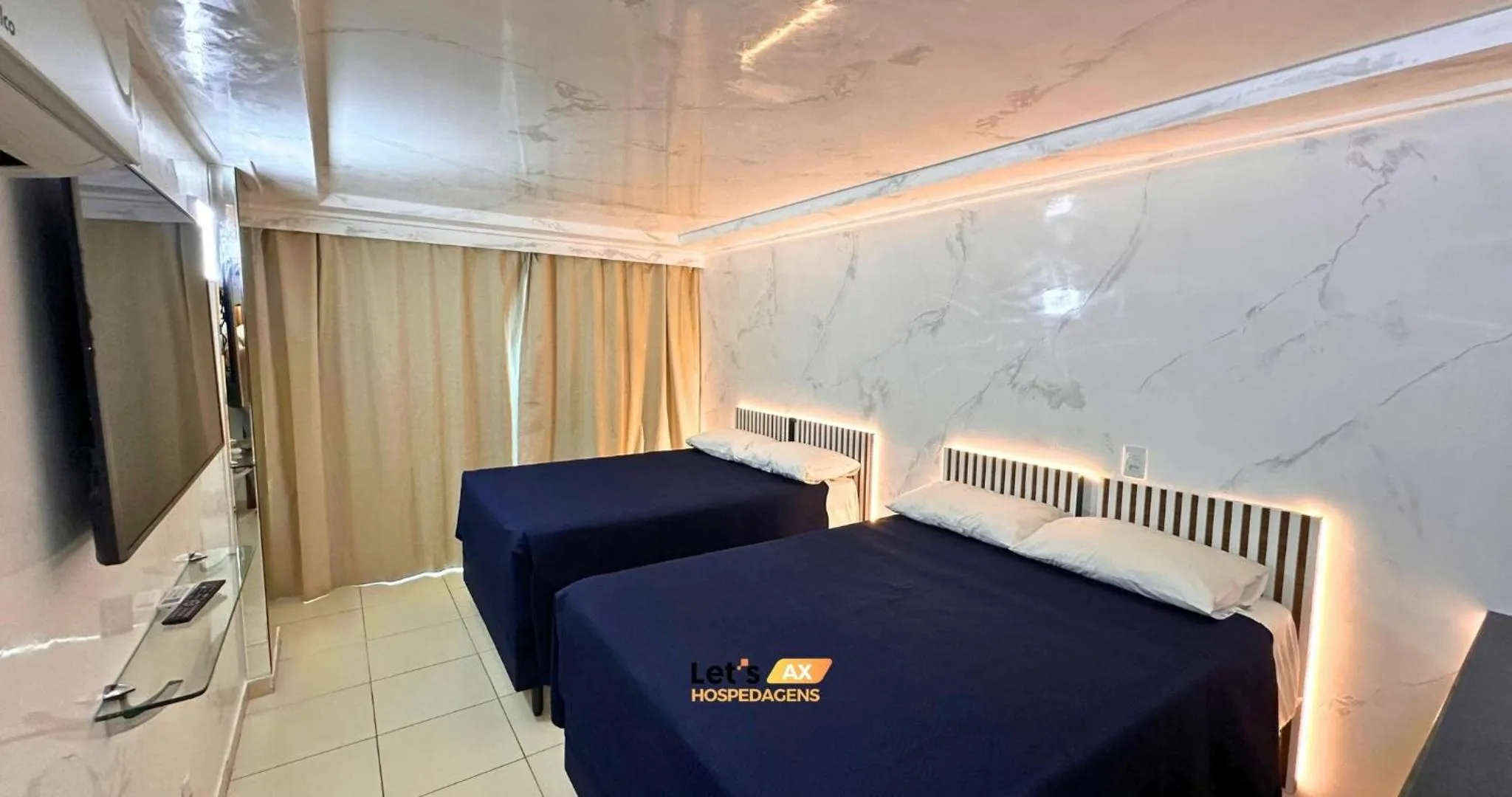 Bed in AX Blue Suítes