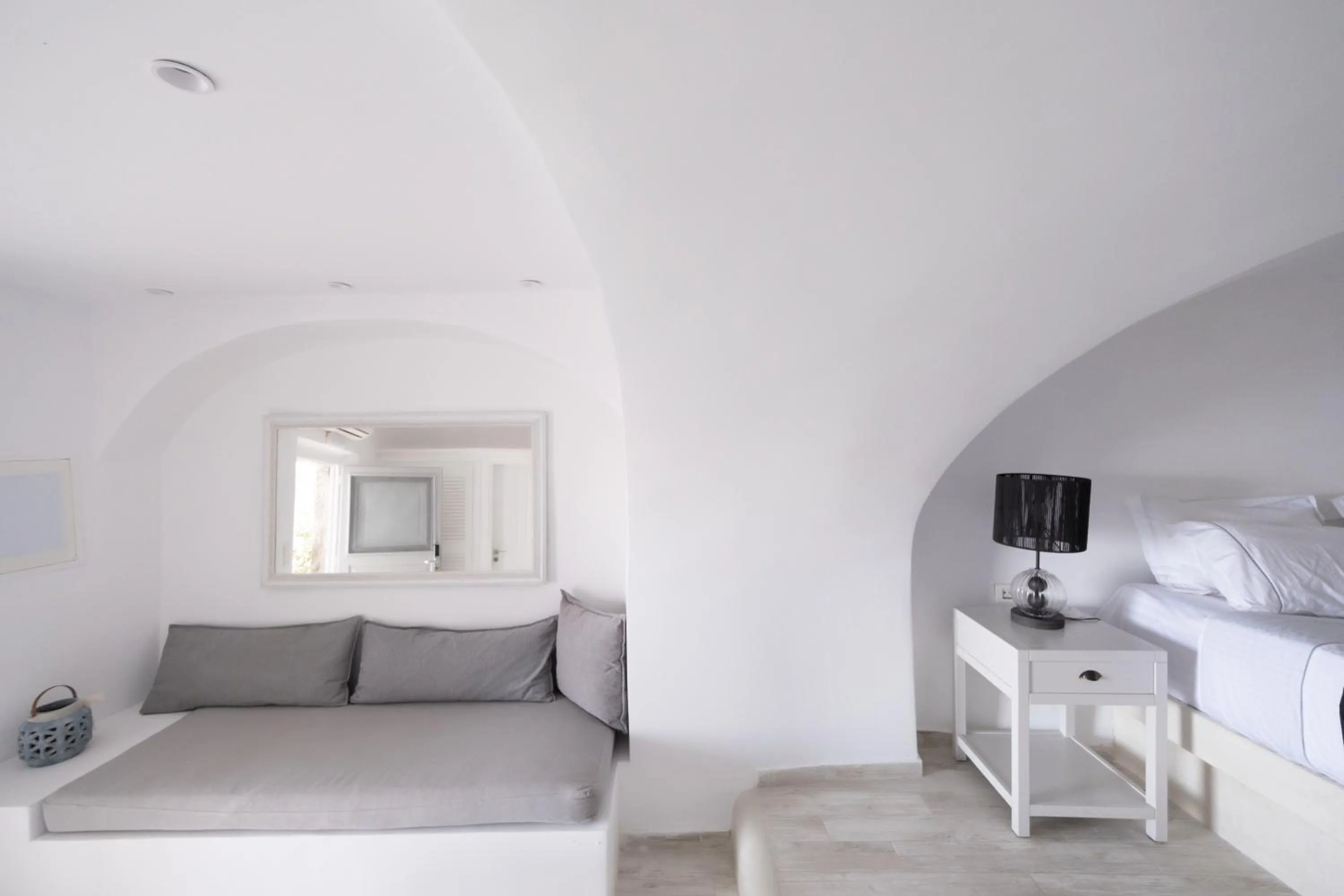 Bed in Anemos Cave Suites