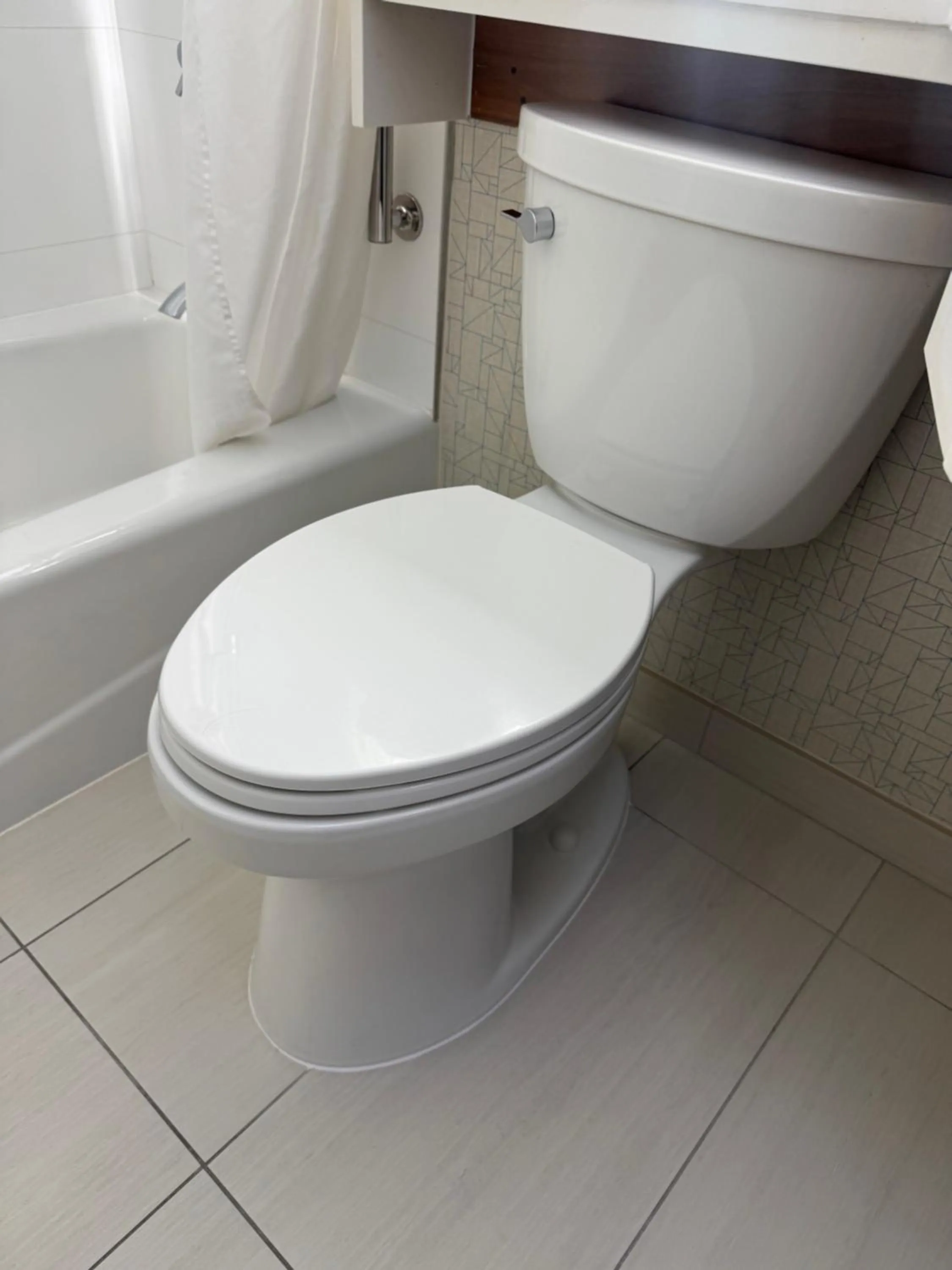 Toilet in Holiday Inn Express - NYC Brooklyn - Sunset Park by IHG