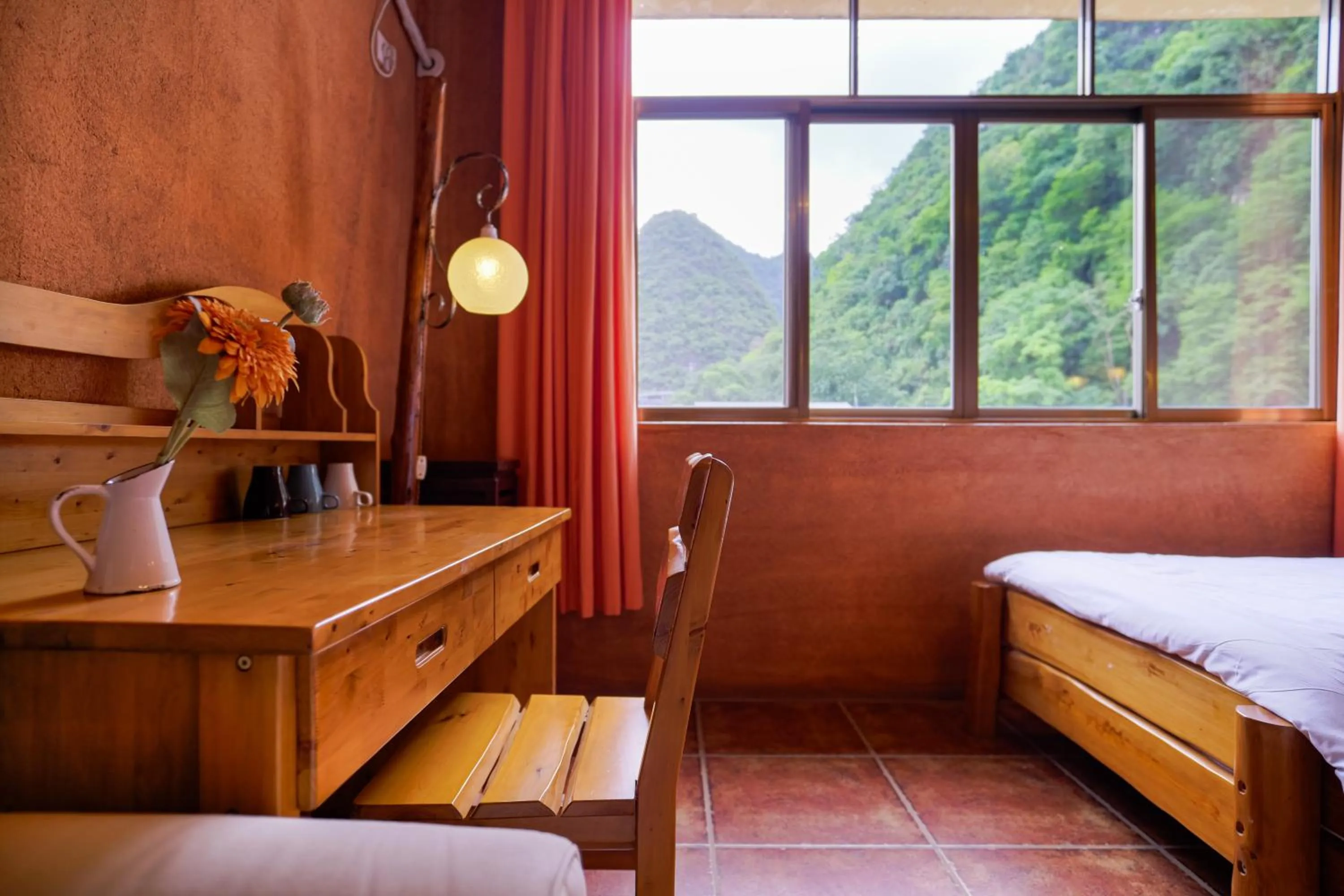 Decorative detail, Bed in YangShuo Eden Inn