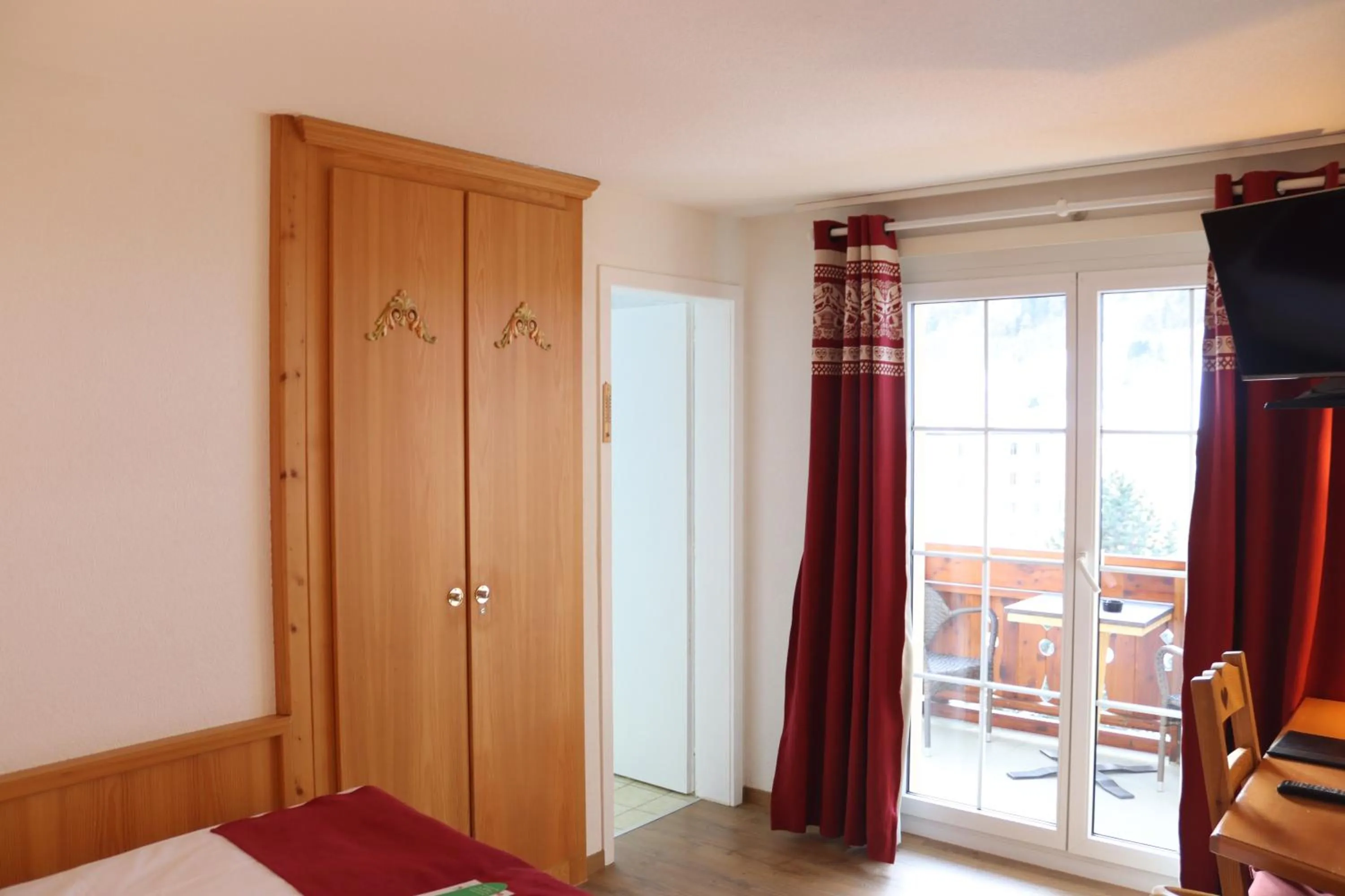 Bed in Grichting Hotel & Serviced Apartments