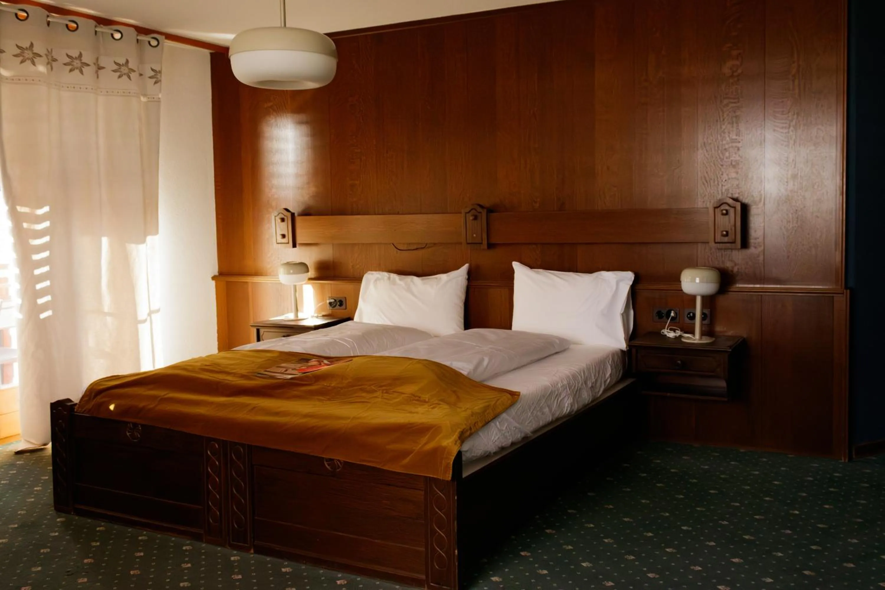 Bed in Grichting Hotel & Serviced Apartments