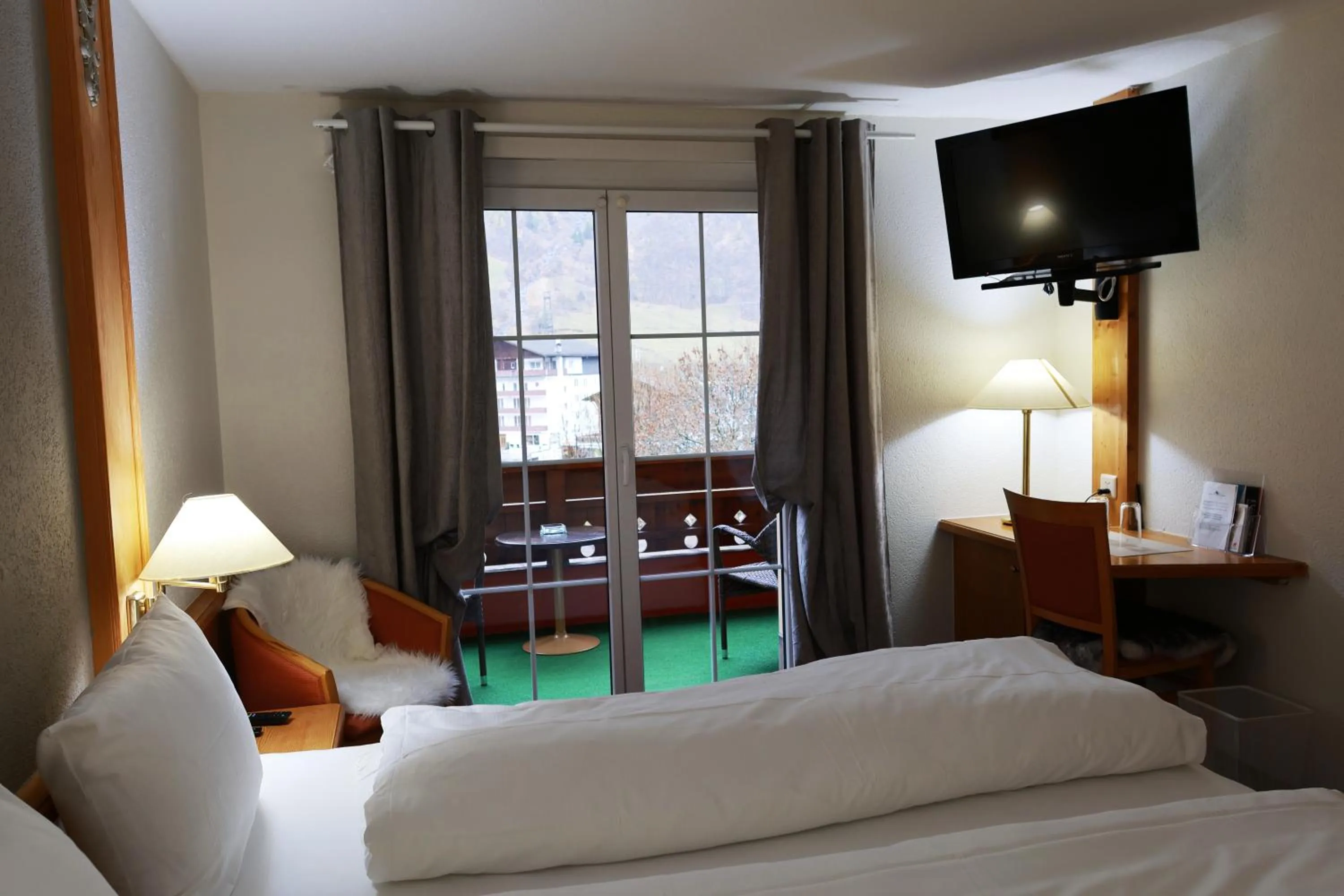 Bed in Grichting Hotel & Serviced Apartments