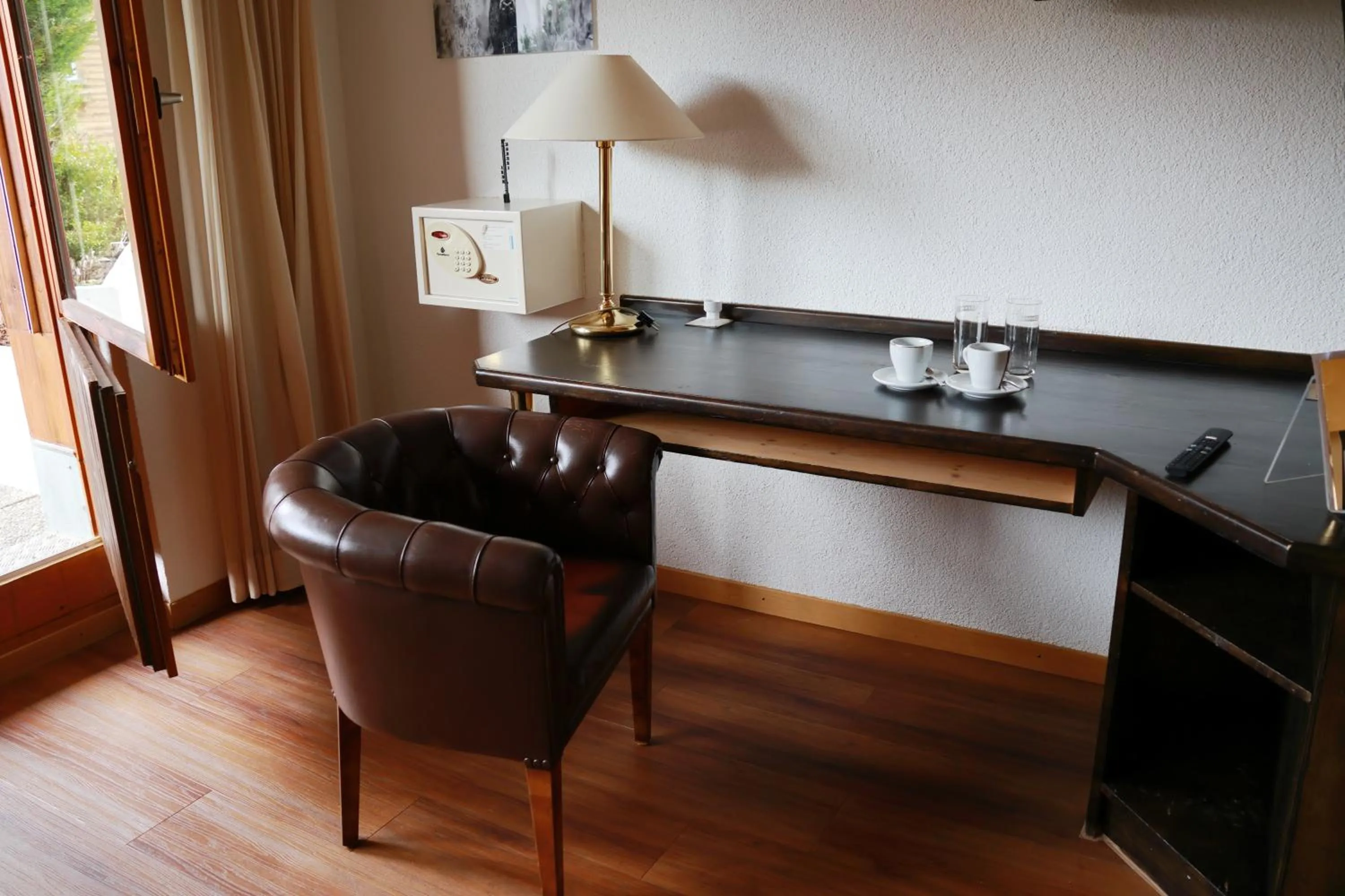 Seating area in Grichting Hotel & Serviced Apartments
