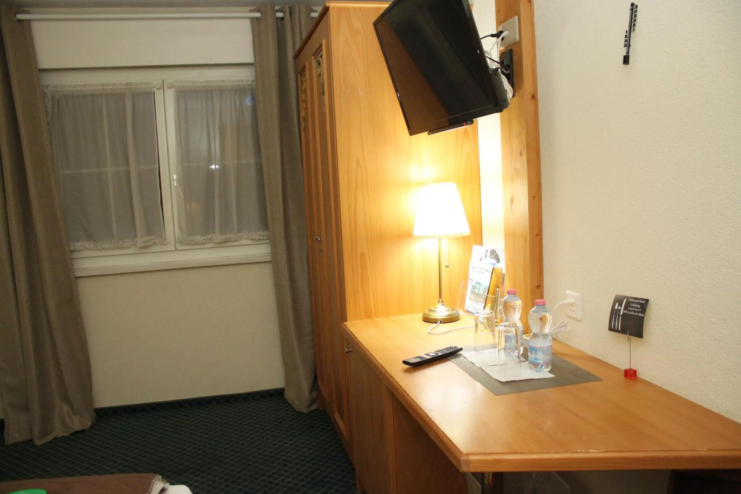 TV and multimedia in Grichting Hotel & Serviced Apartments