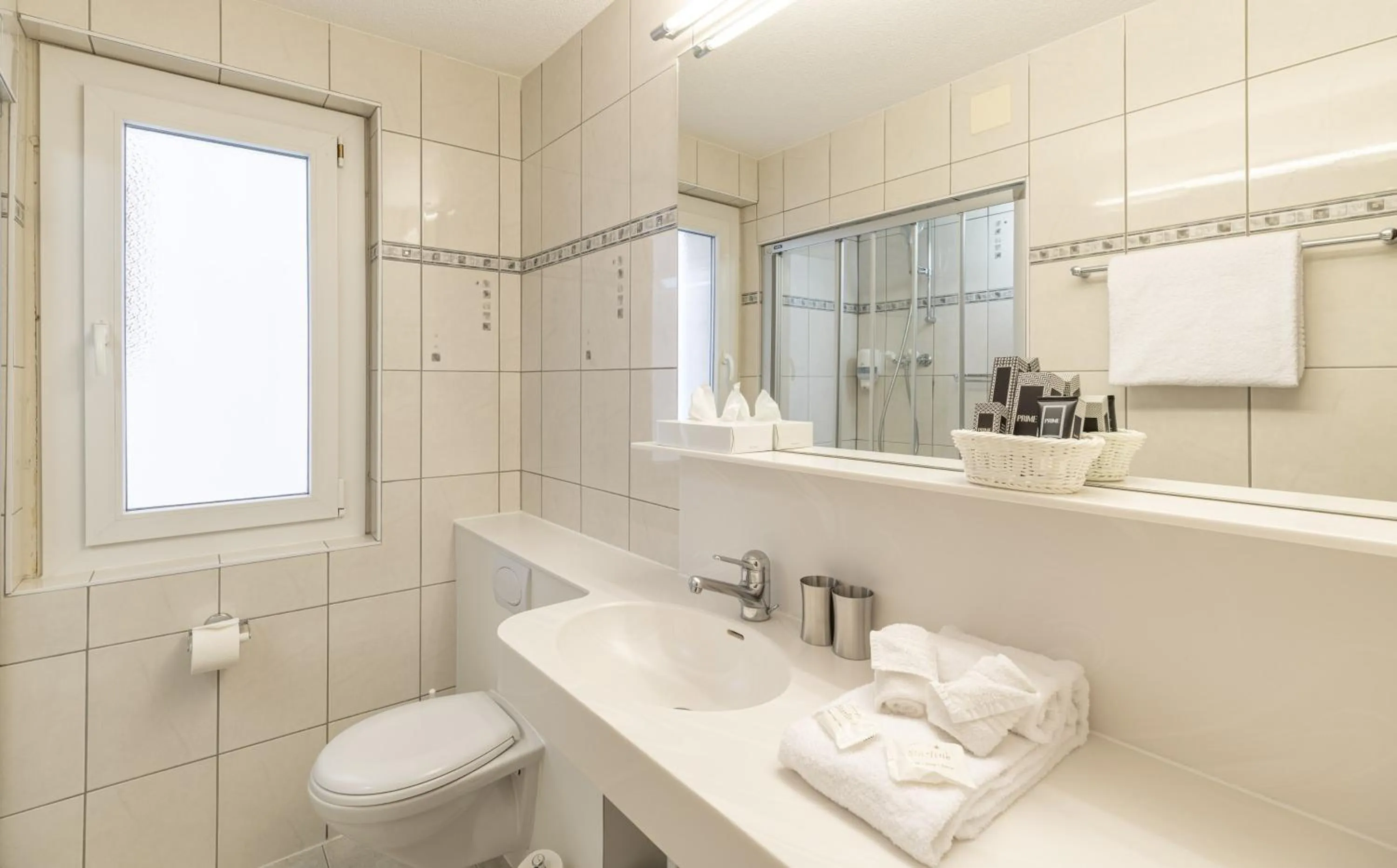 Bathroom in Grichting Hotel & Serviced Apartments