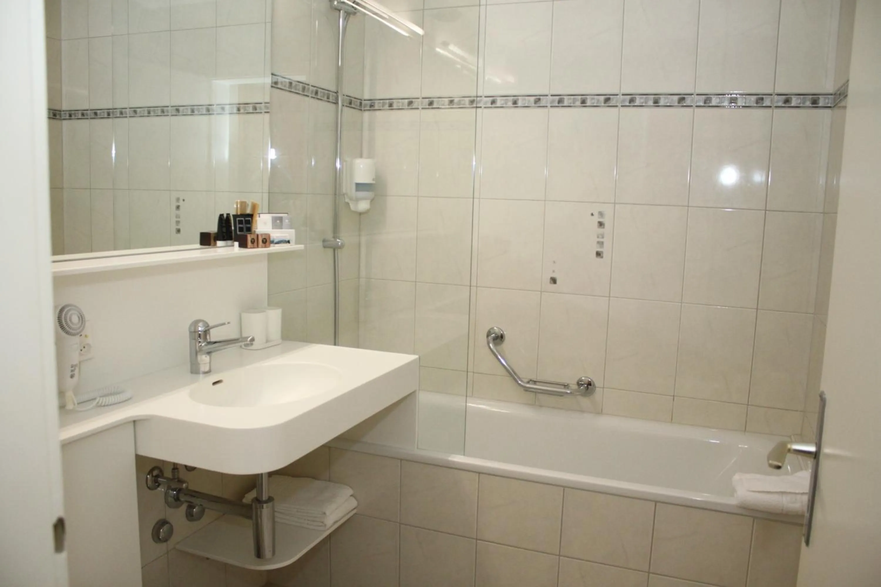 Toilet in Grichting Hotel & Serviced Apartments