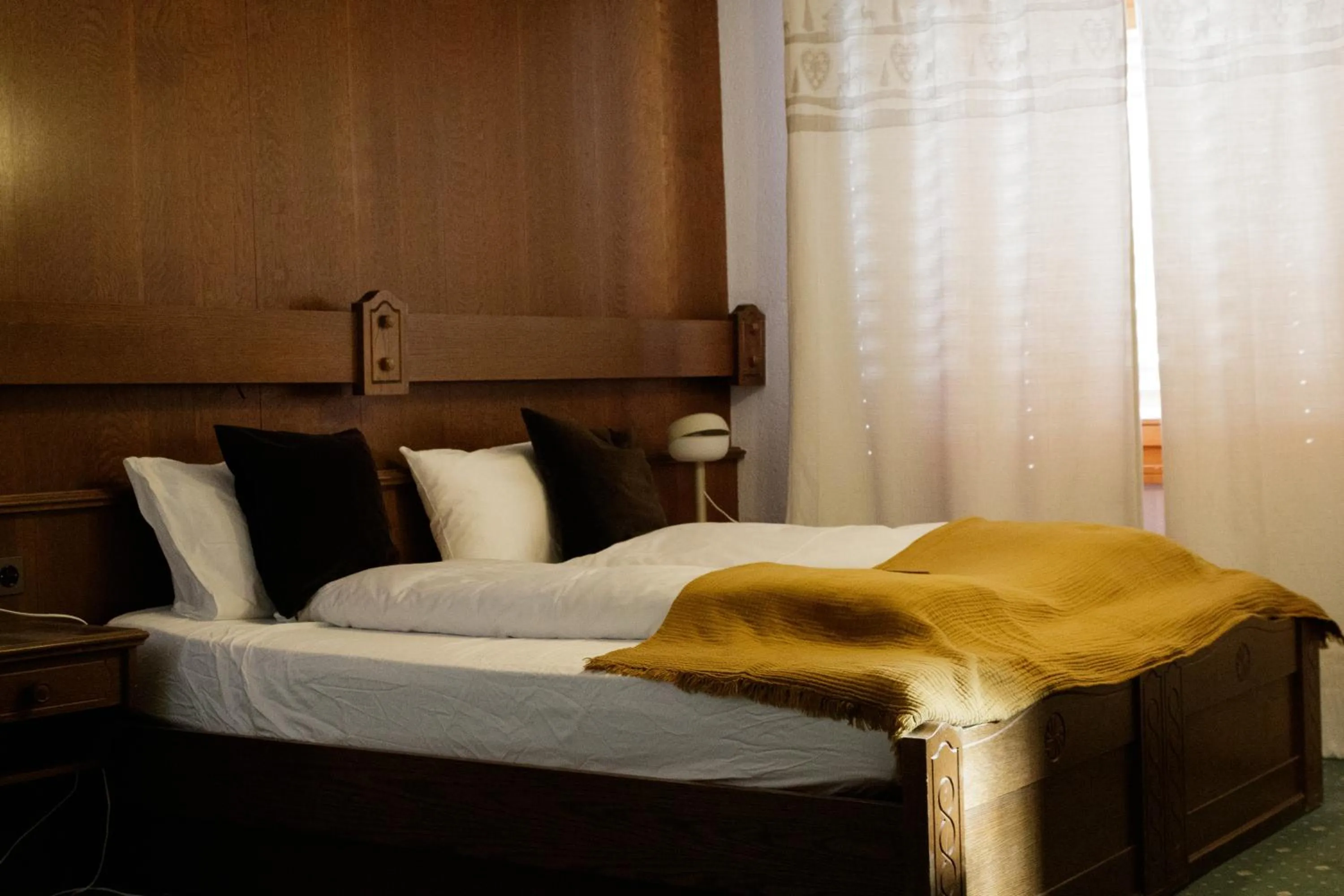 Bed in Grichting Hotel & Serviced Apartments