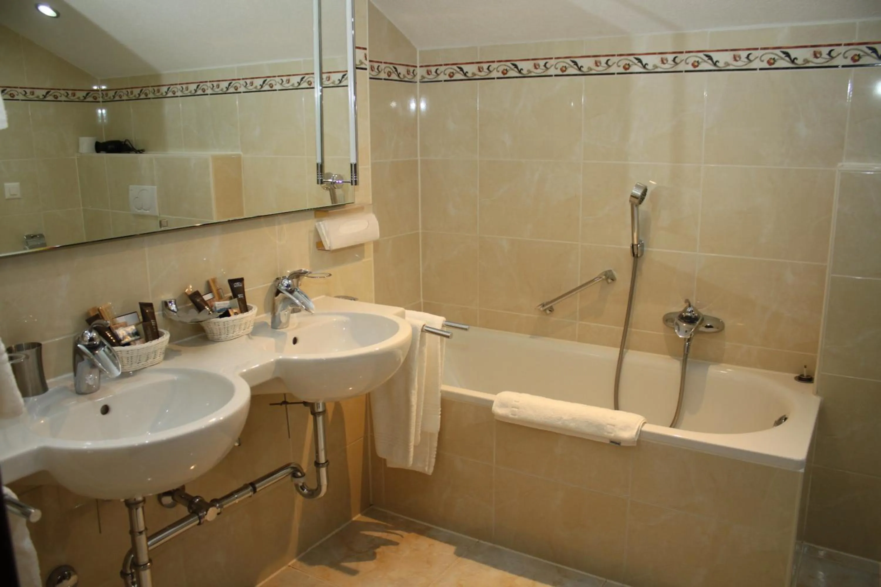 Shower in Grichting Hotel & Serviced Apartments
