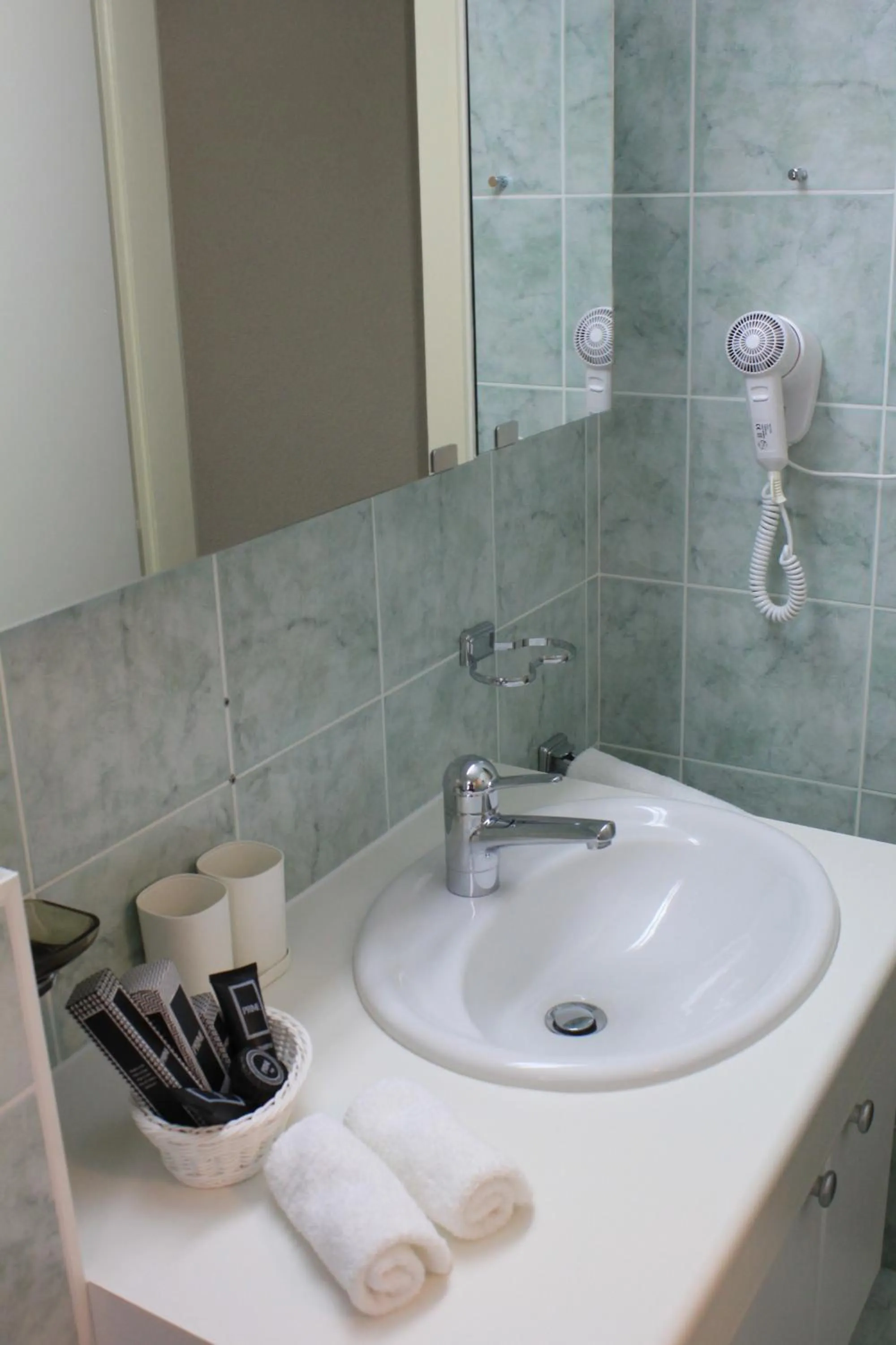 Bathroom in Grichting Hotel & Serviced Apartments
