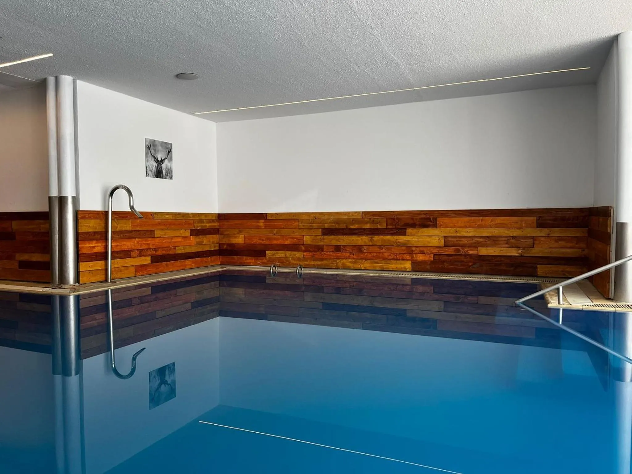 Pool view in Grichting Hotel & Serviced Apartments