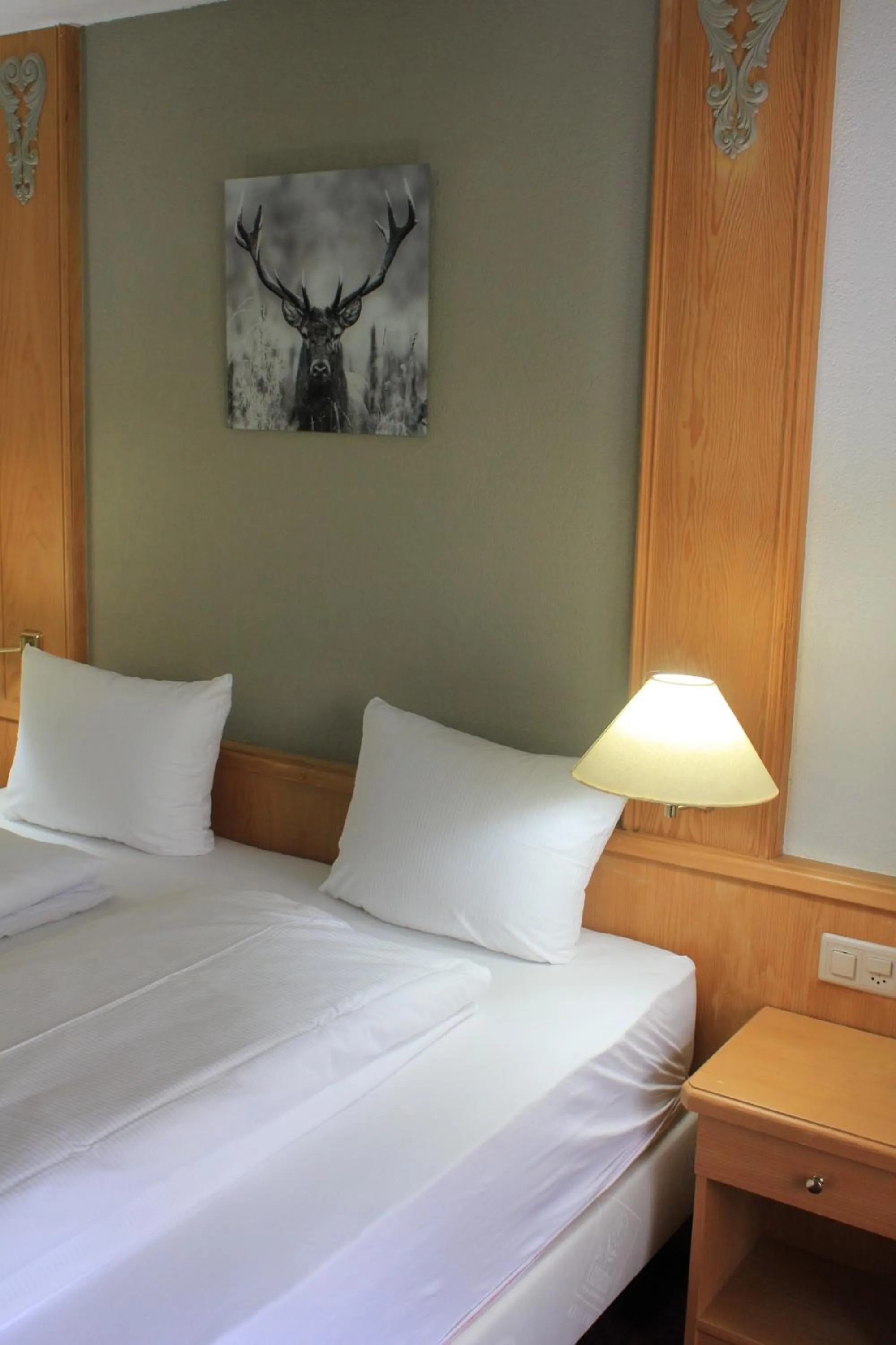 Bed in Grichting Hotel & Serviced Apartments