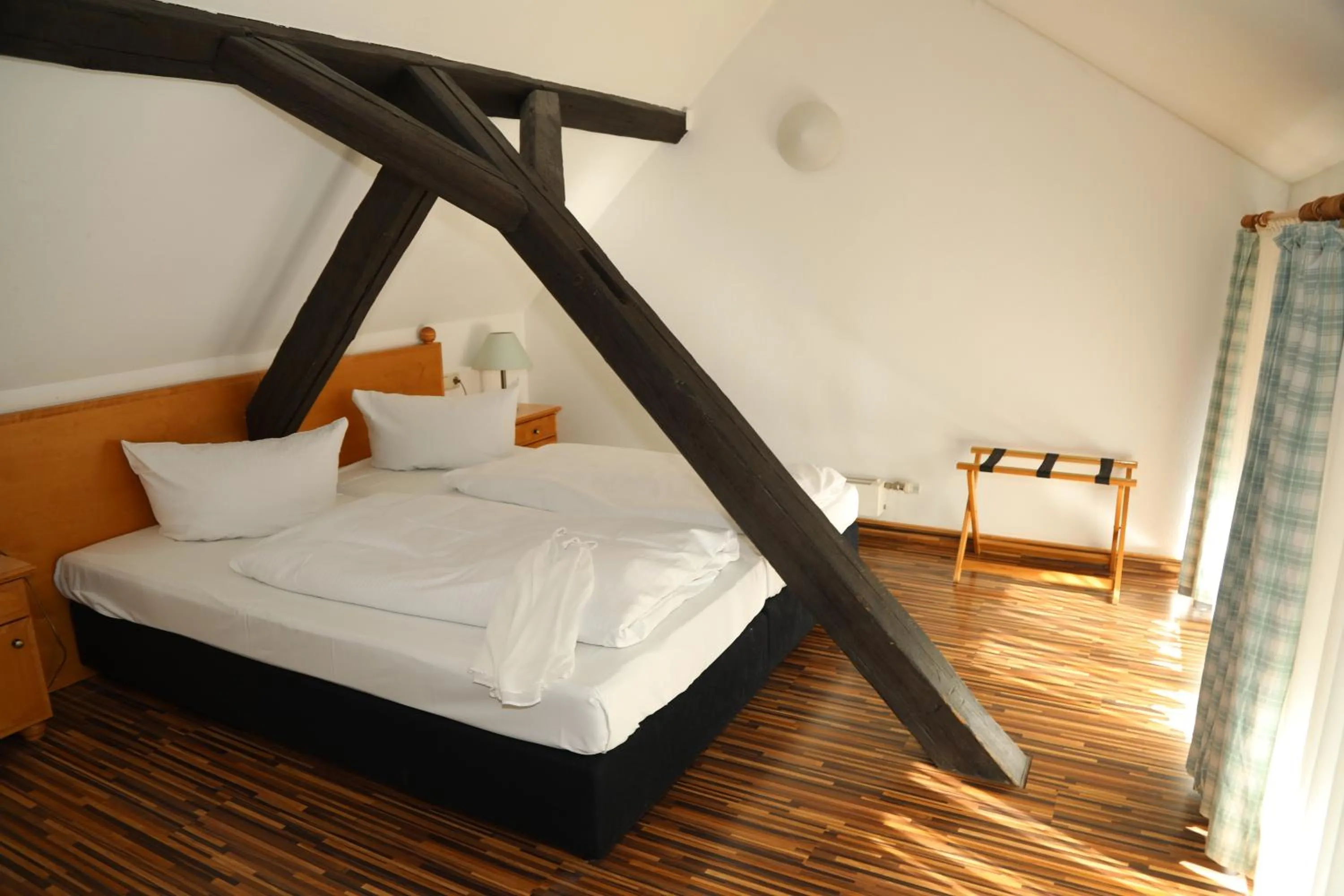Photo of the whole room, Bed in eXo Hotel Franka Bamberg - by NeVo Hotels