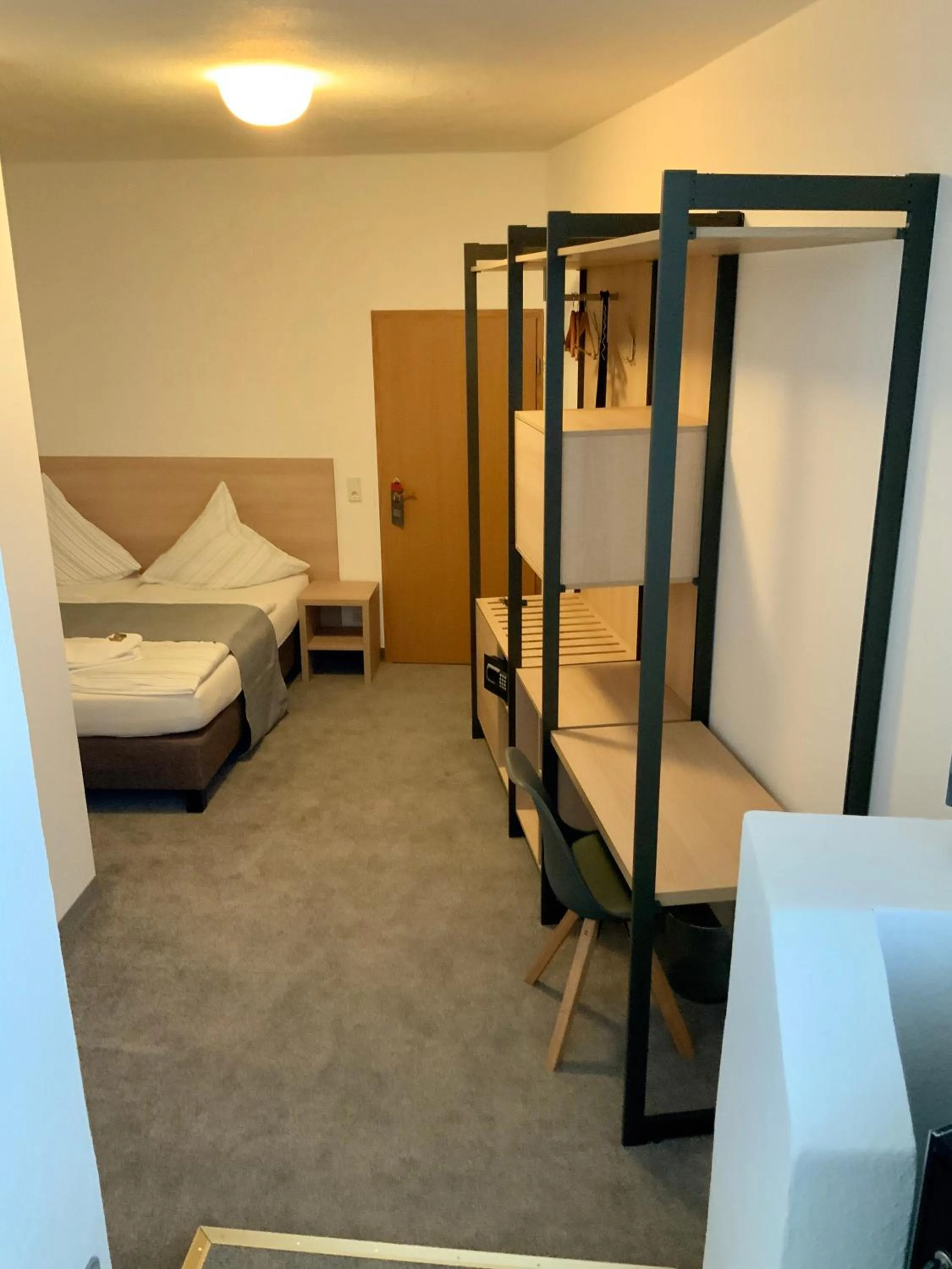 Photo of the whole room, Bed in Bluhm's Hotel & Restaurant am Markt