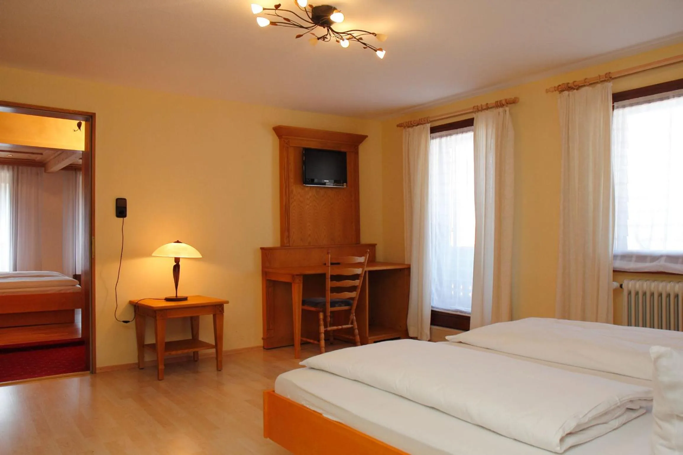 Photo of the whole room, Bed in Parkhotel Waldlust