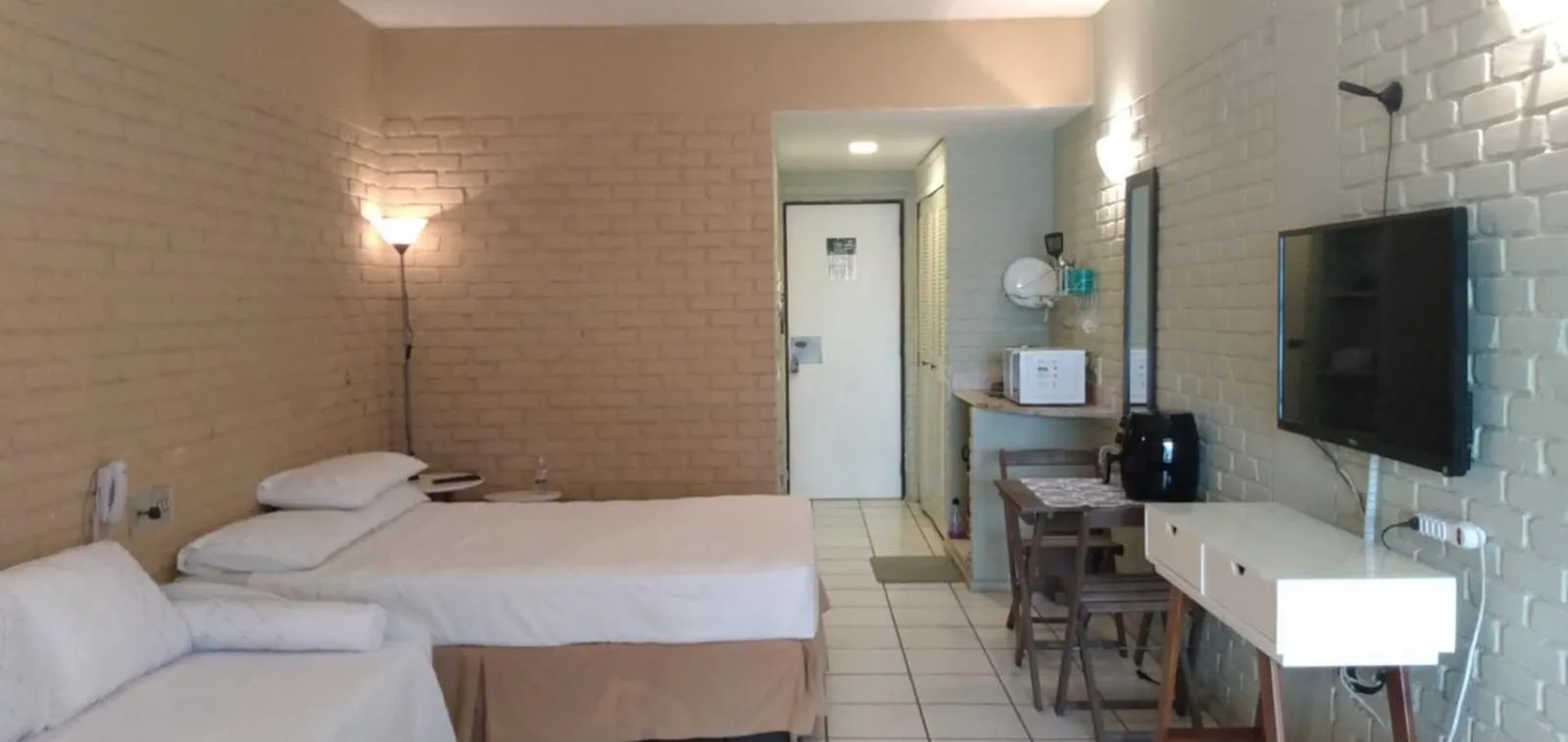 Bed in Angra dos Reis Flat Suíte no Portogalo