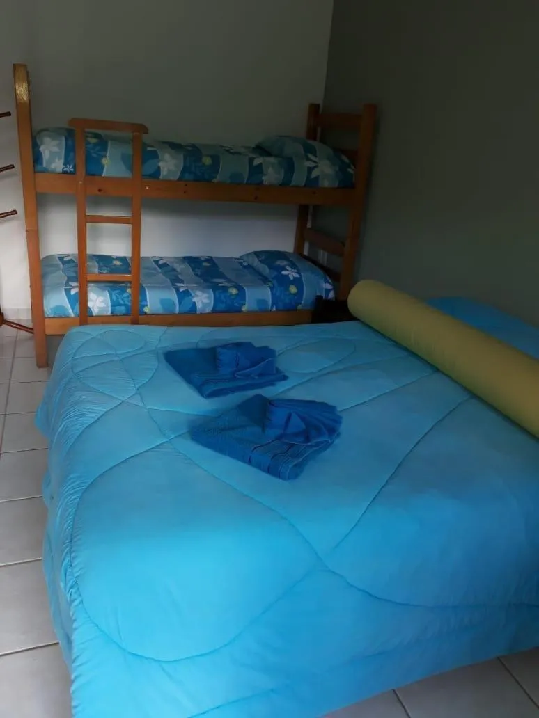 Bed in Colinas Capivari Suites