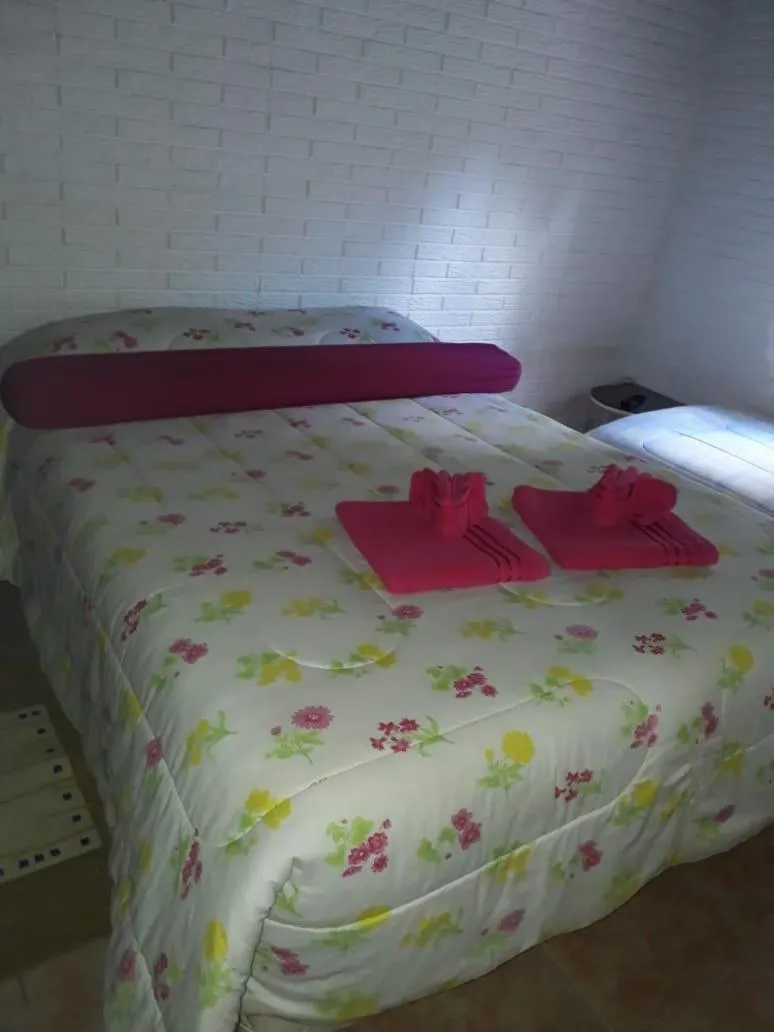 Bed in Colinas Capivari Suites