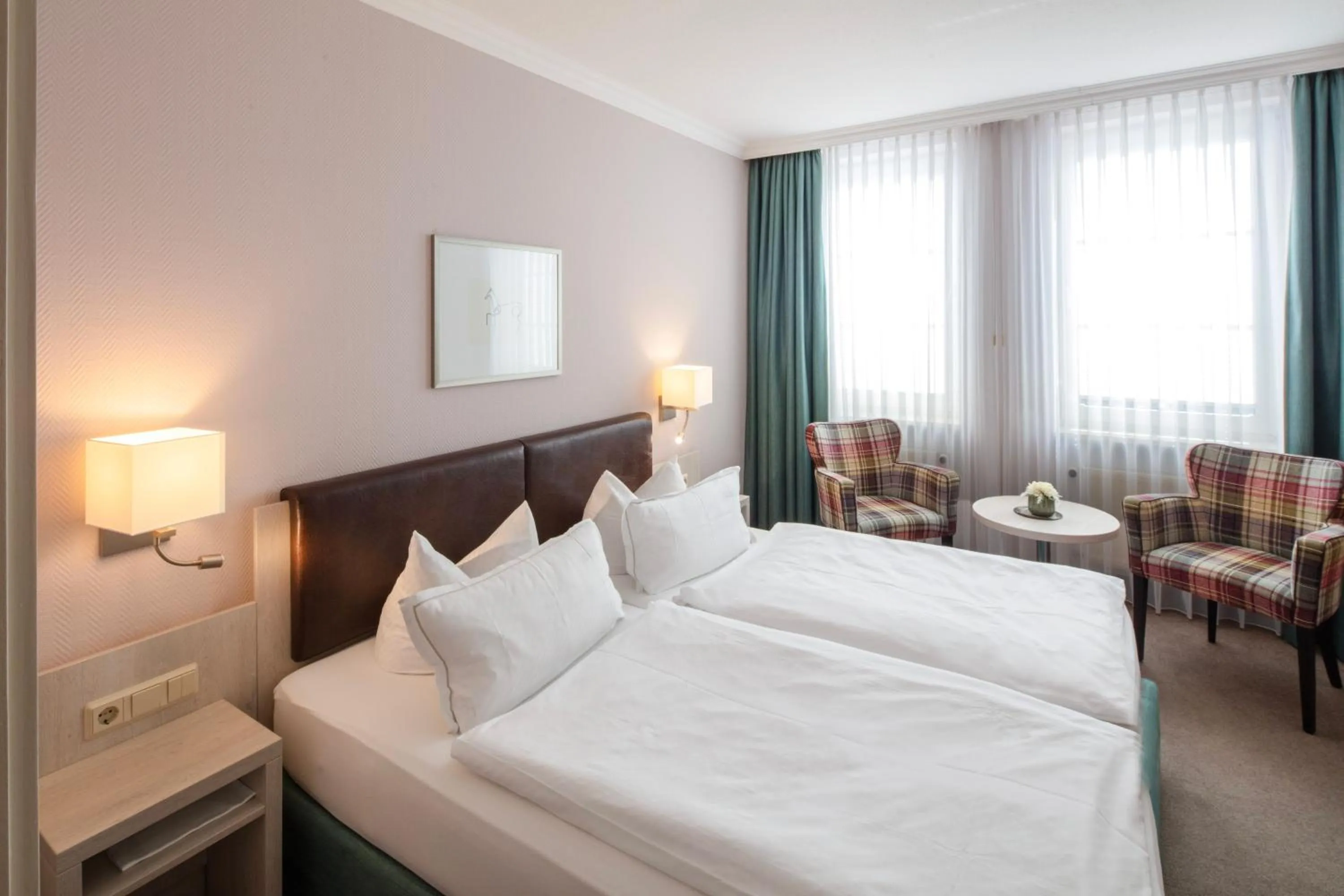 Bed in Hotel Braunschweiger Hof