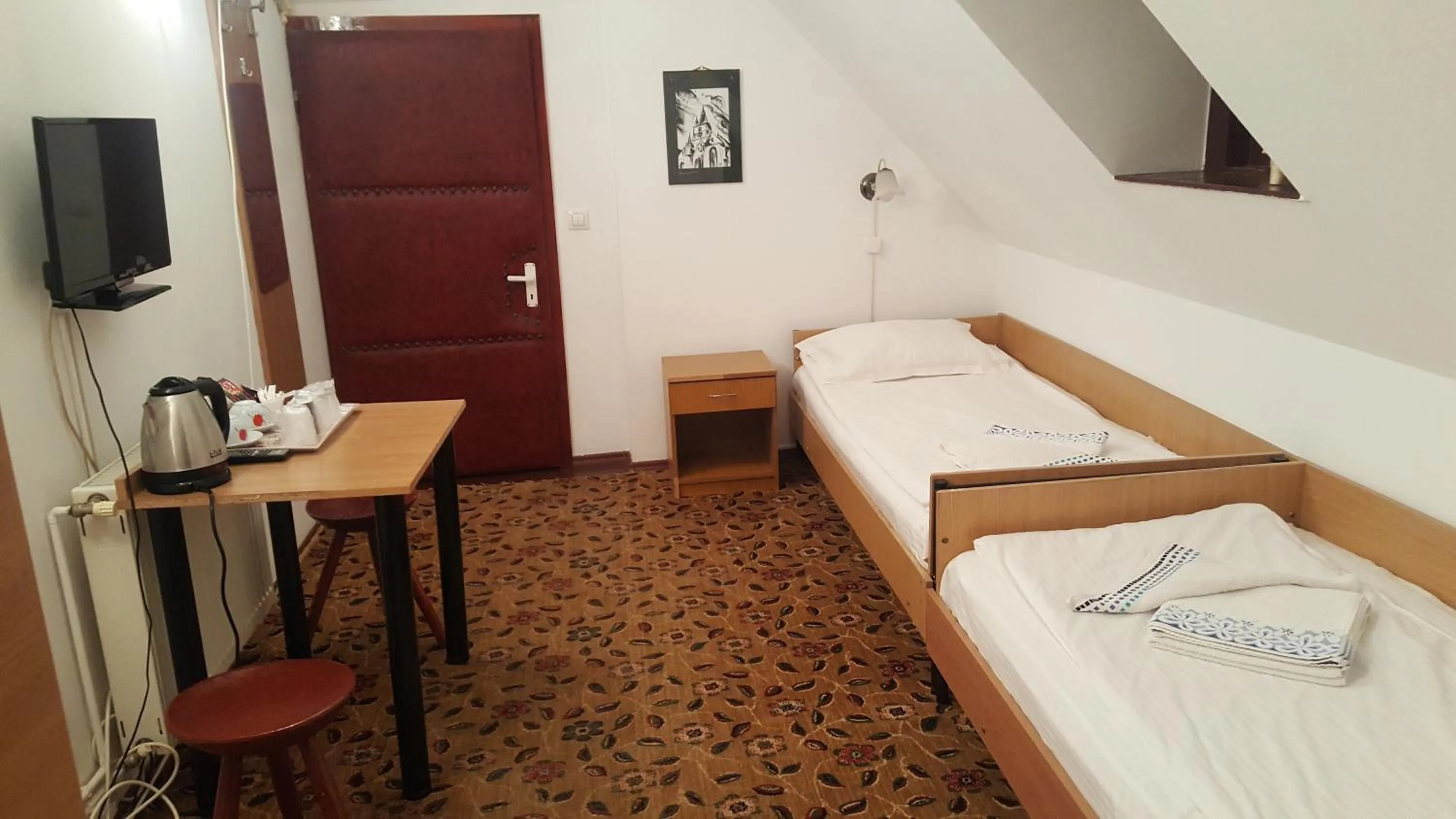 Bed in Pensiunea Podul Minciunilor