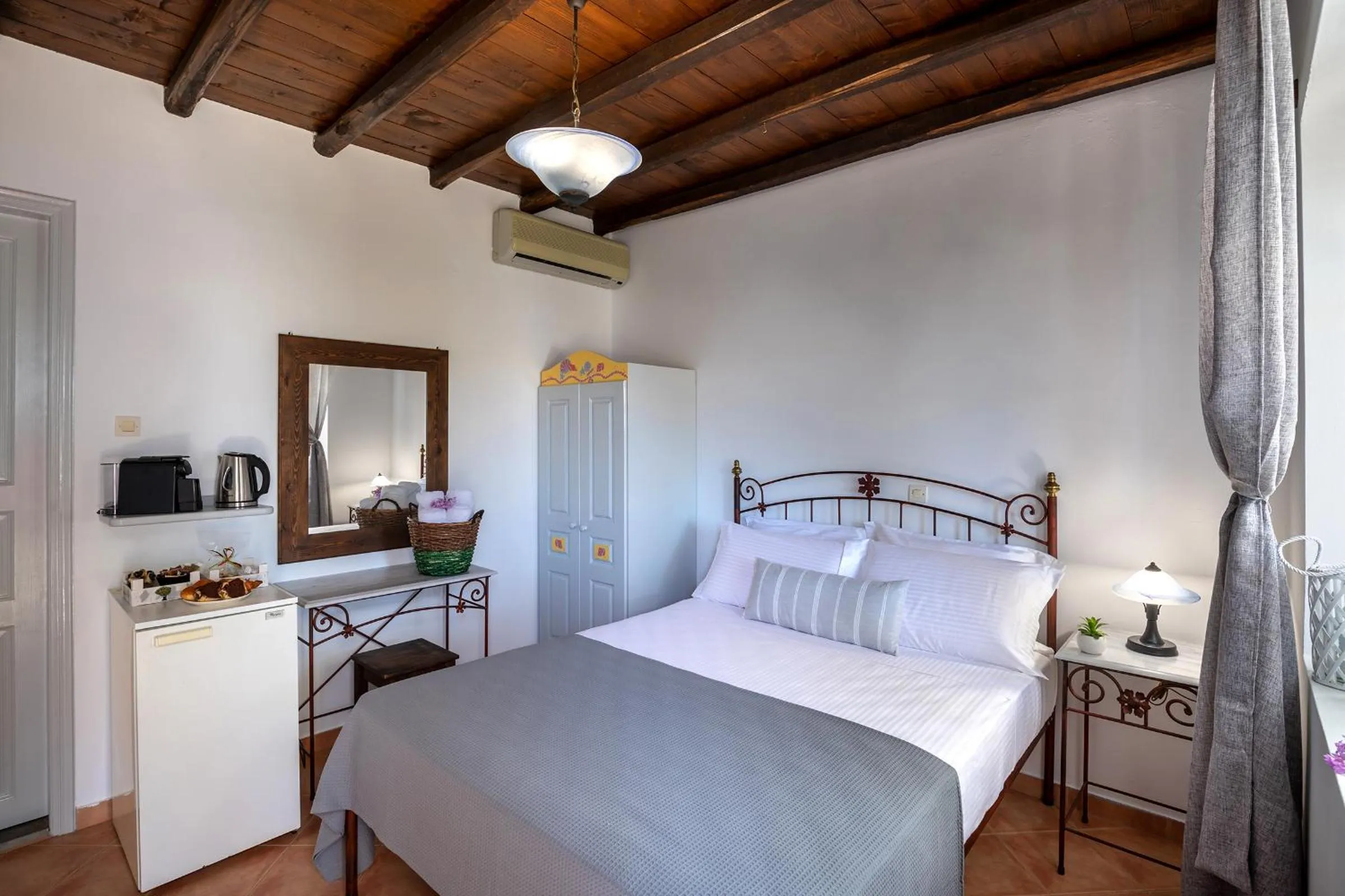 Bed in Cochili Rooms & Apartments