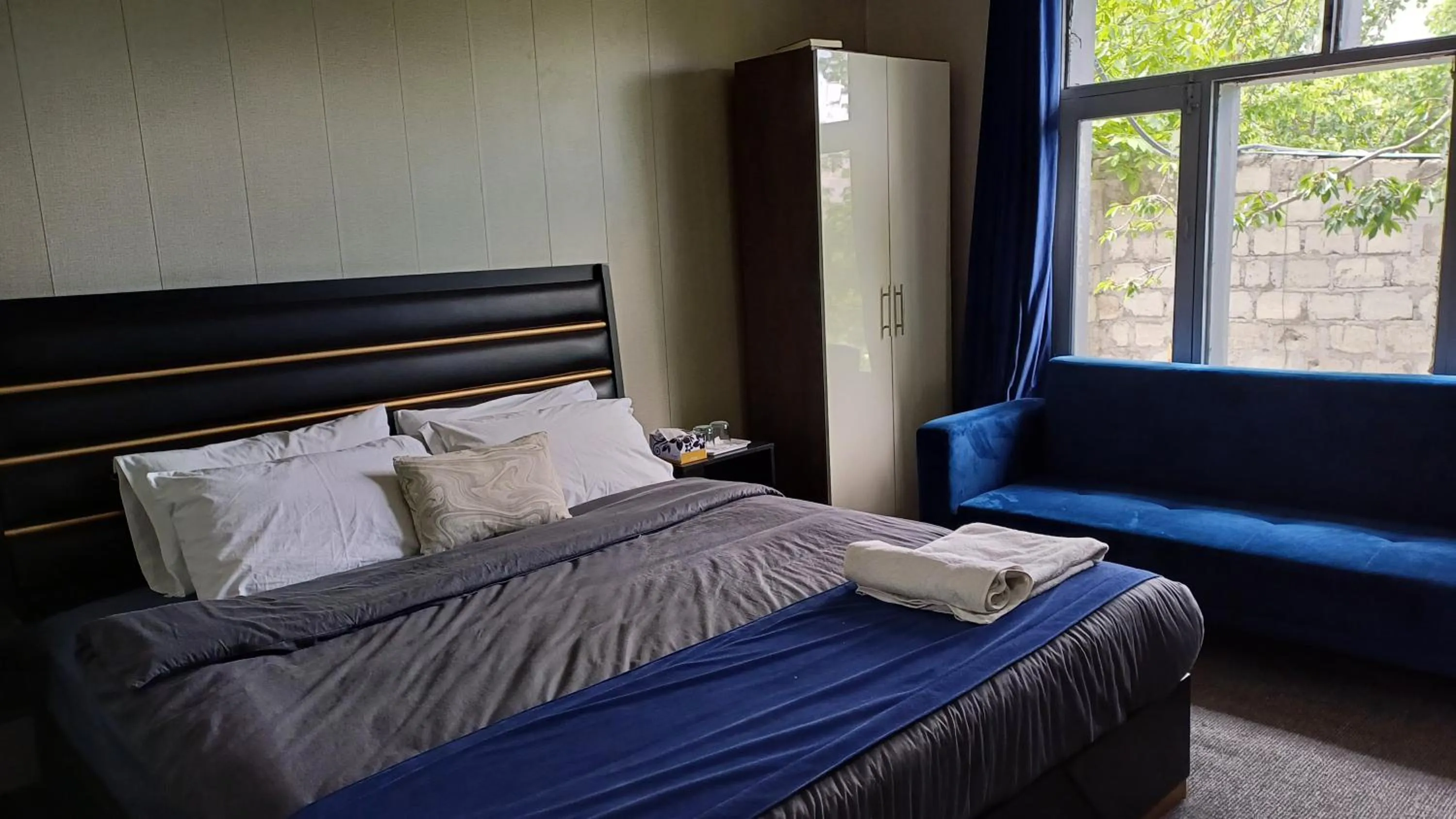 Bed in Grapes Garden Resort Hunza