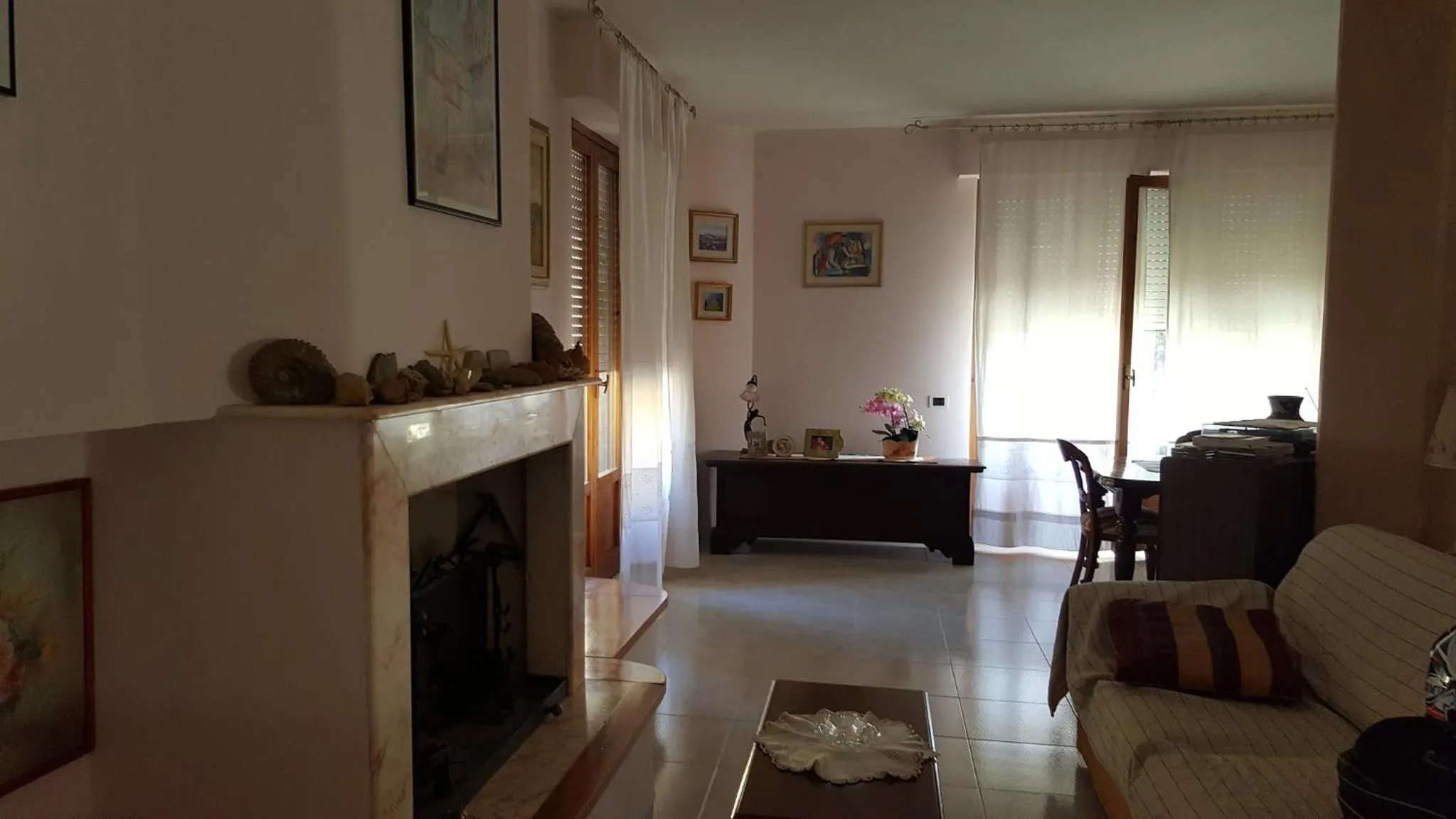 Communal lounge/ TV room in B&B I Fiori