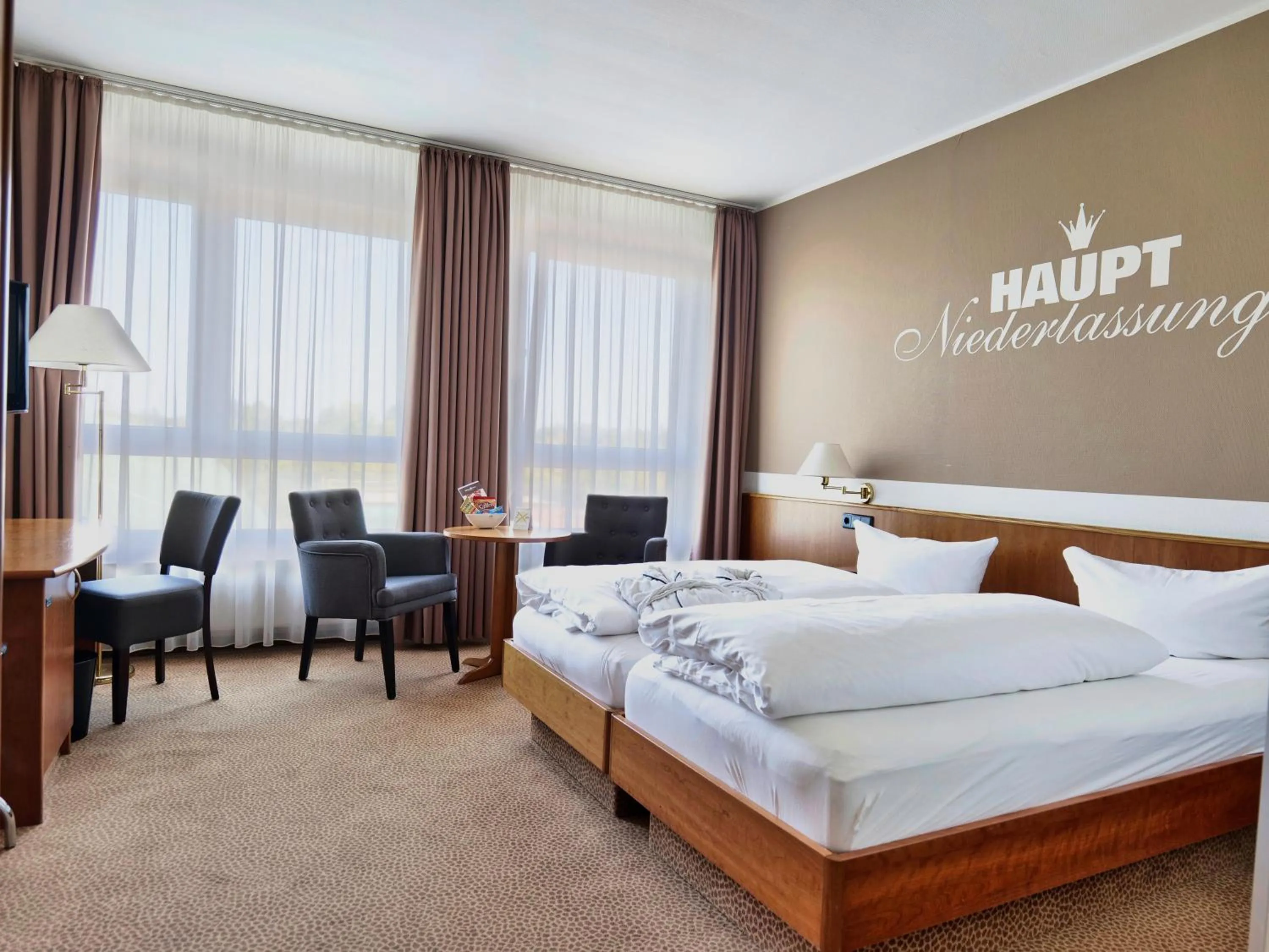 Photo of the whole room, Bed in Hotel Sportwelt Radeberg