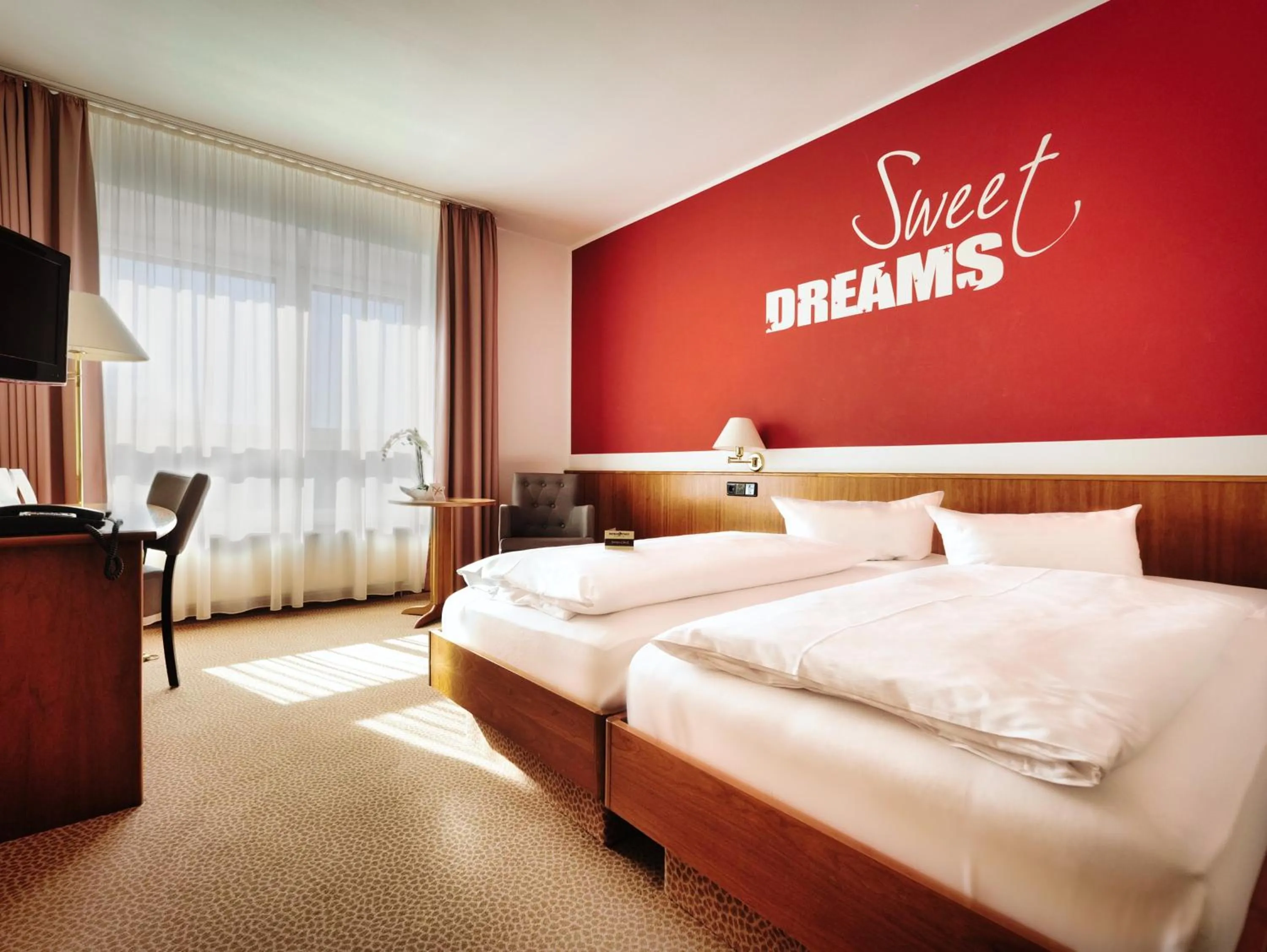 Photo of the whole room, Bed in Hotel Sportwelt Radeberg