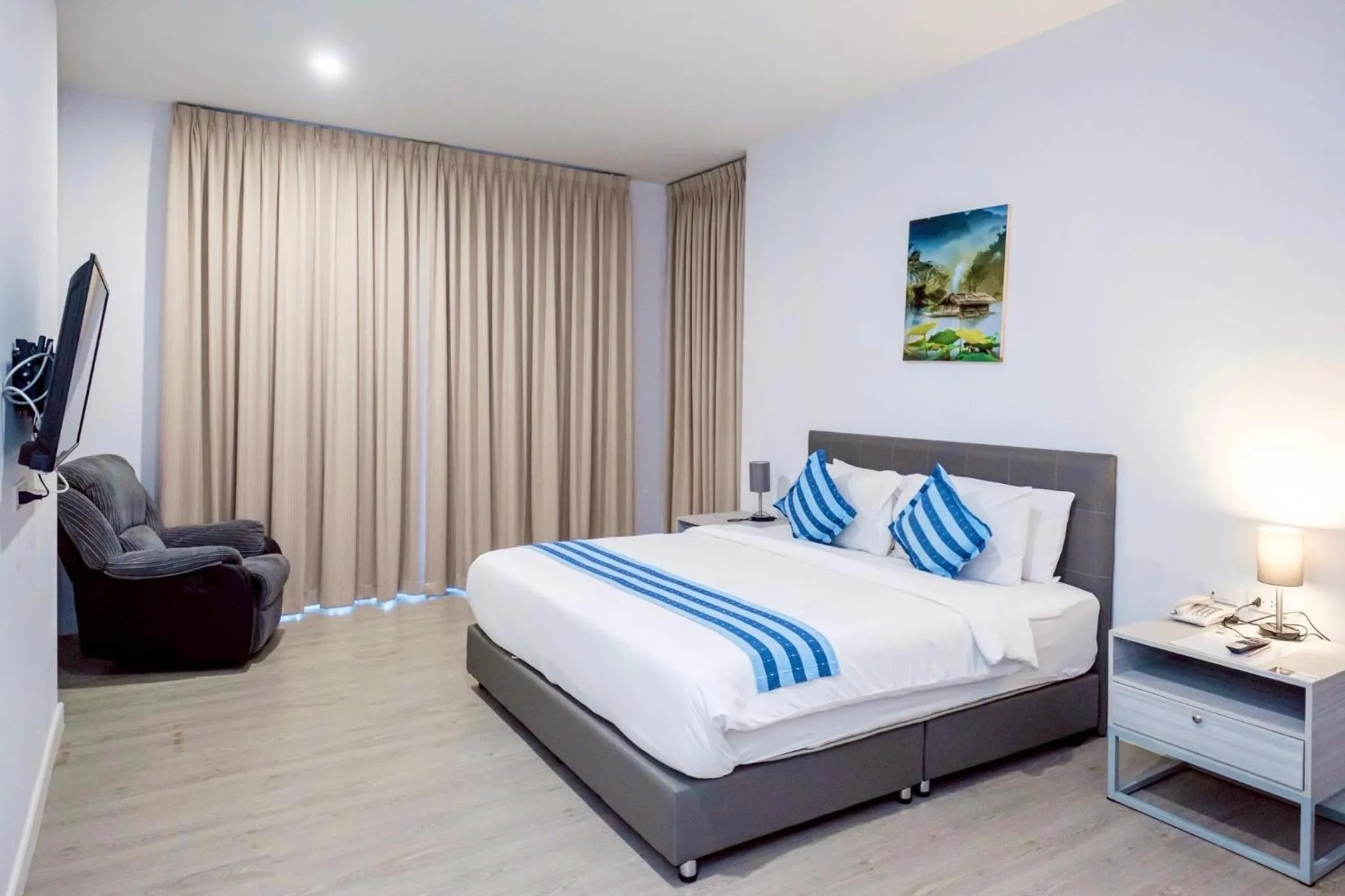 Bed in GRAND PA Hotel&Resort Lamphun Chiang Mai