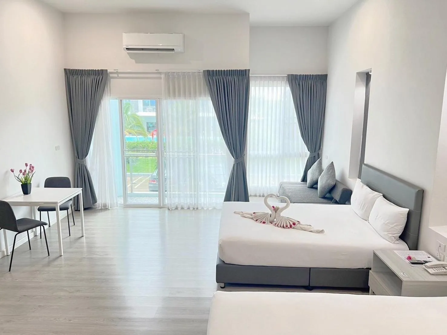 Bed in GRAND PA Hotel&Resort Lamphun Chiang Mai