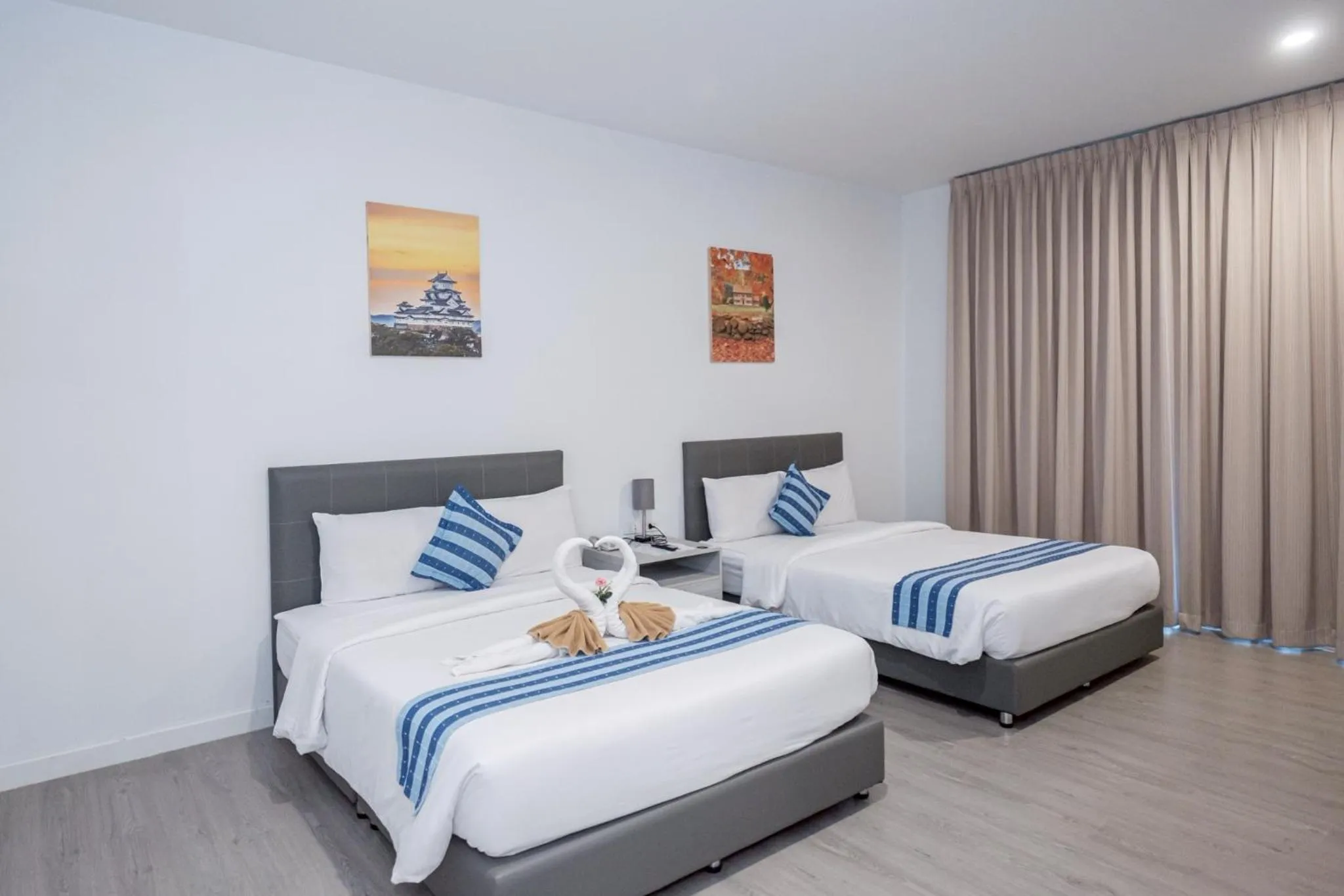 Bed in GRAND PA Hotel&Resort Lamphun Chiang Mai