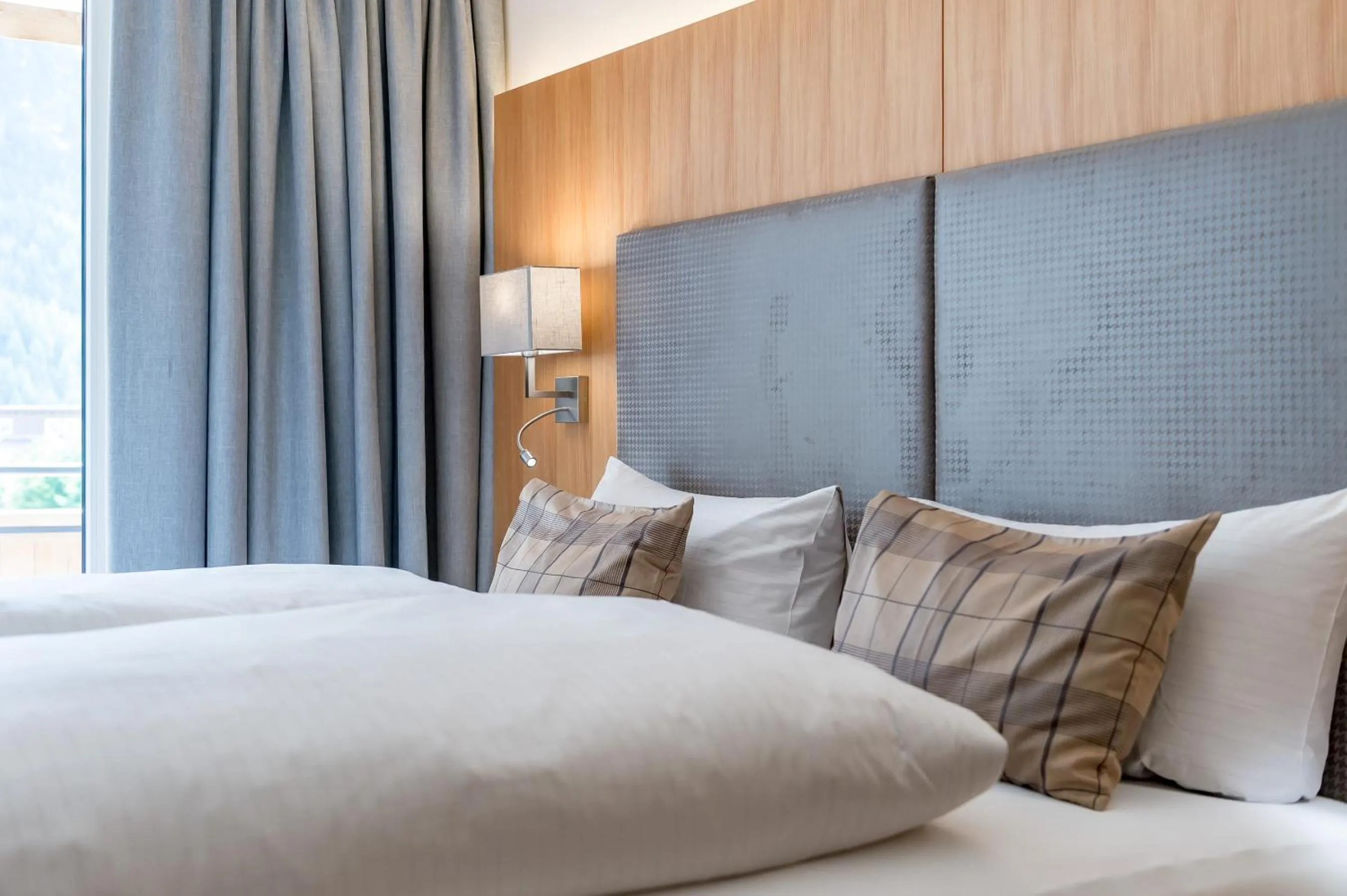 Bedroom, Bed in Hotel Andy 4 Sterne Superior