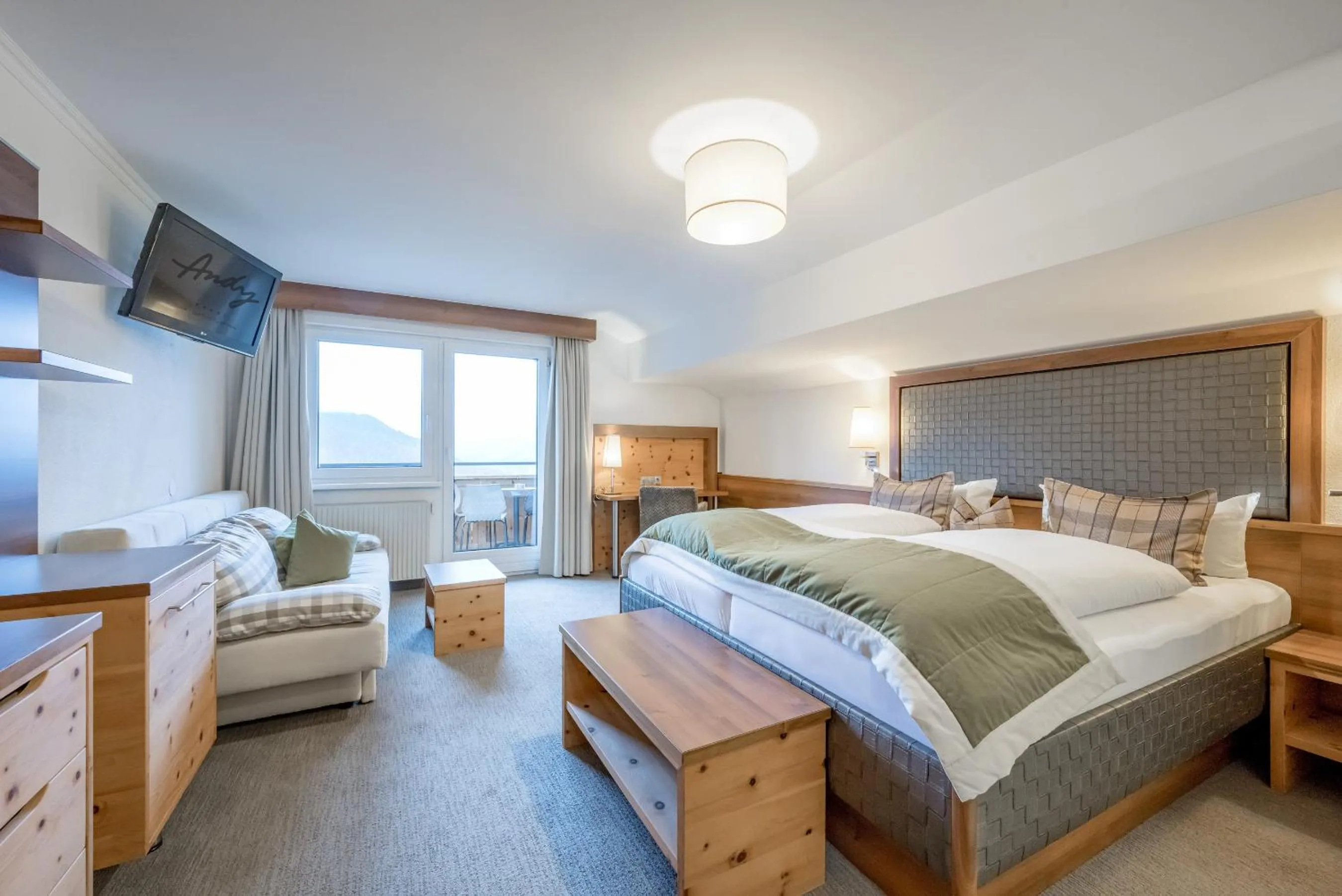 Bed in Hotel Andy 4 Sterne Superior