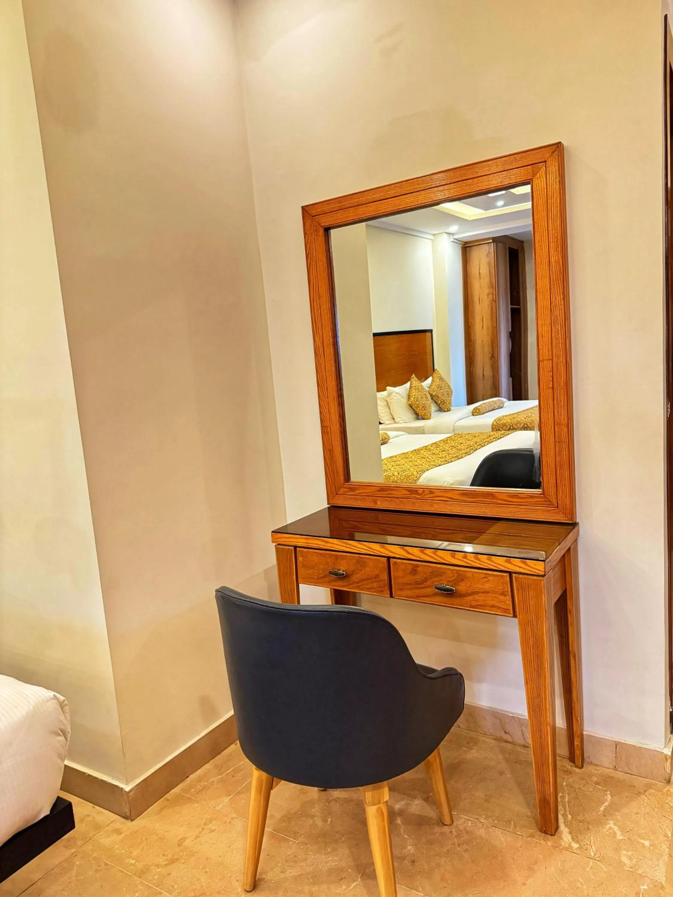 Bed in Grand Islamabad Hotel