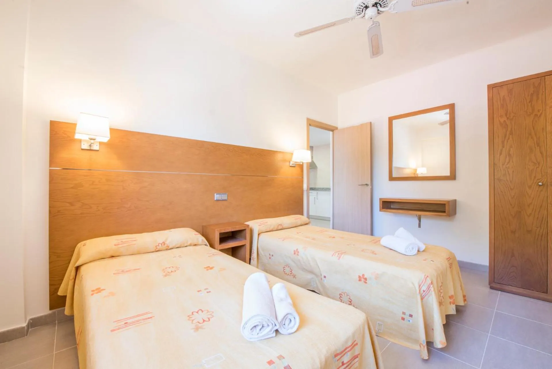 Bed in APARTAMENTOS DON JUAN