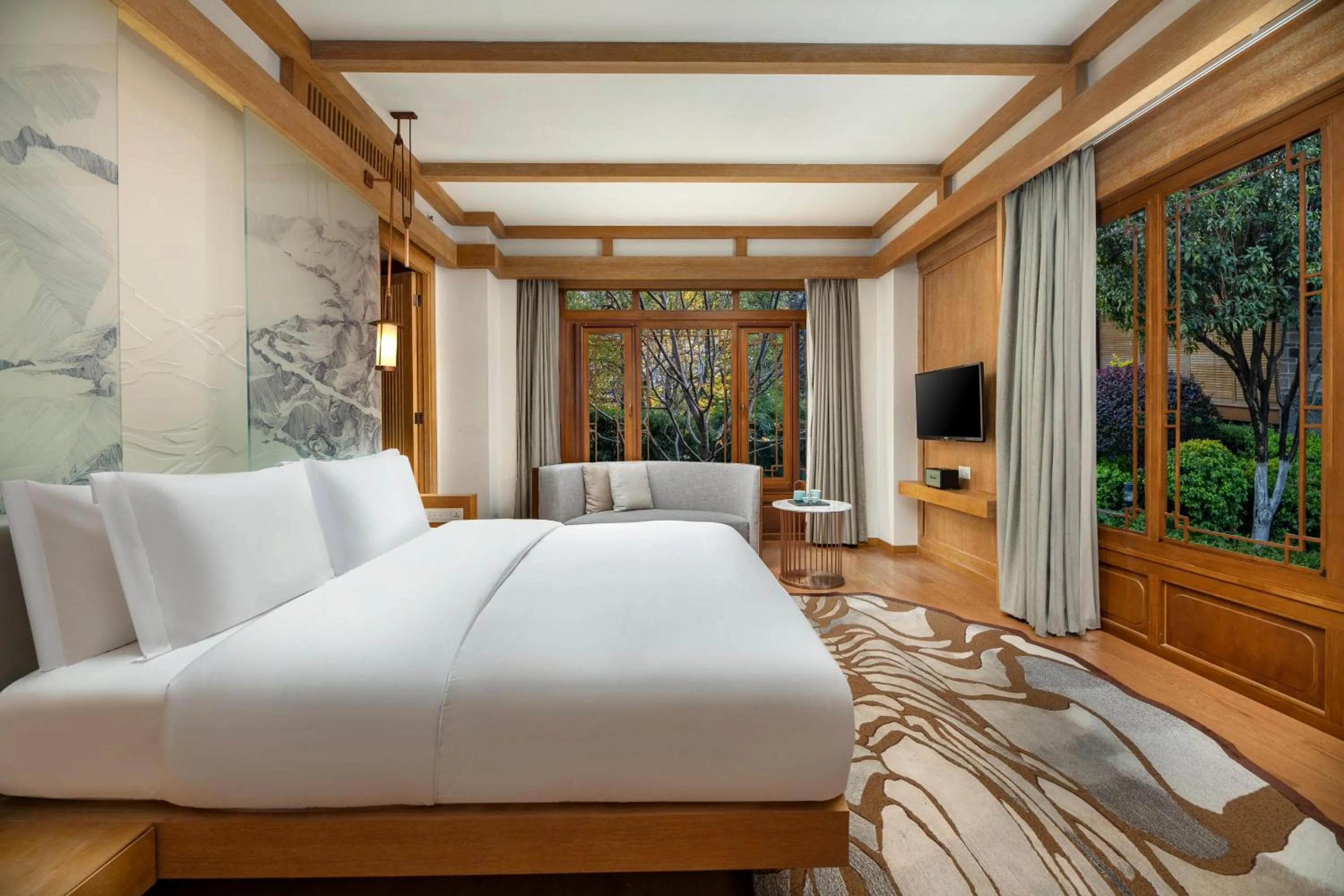 Photo of the whole room, Bed in Hotel Indigo Lijiang Ancient Town by IHG