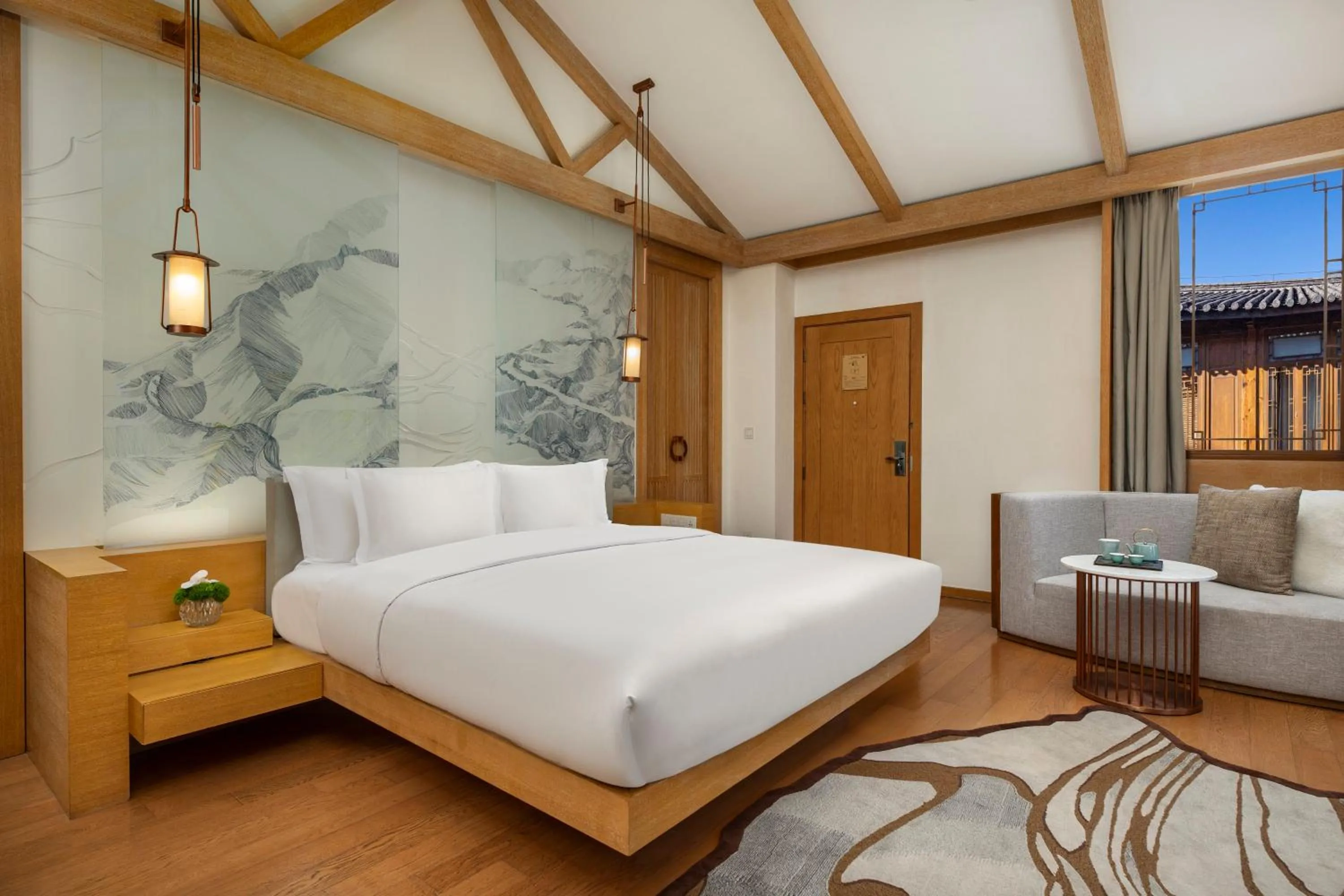 Photo of the whole room, Bed in Hotel Indigo Lijiang Ancient Town by IHG