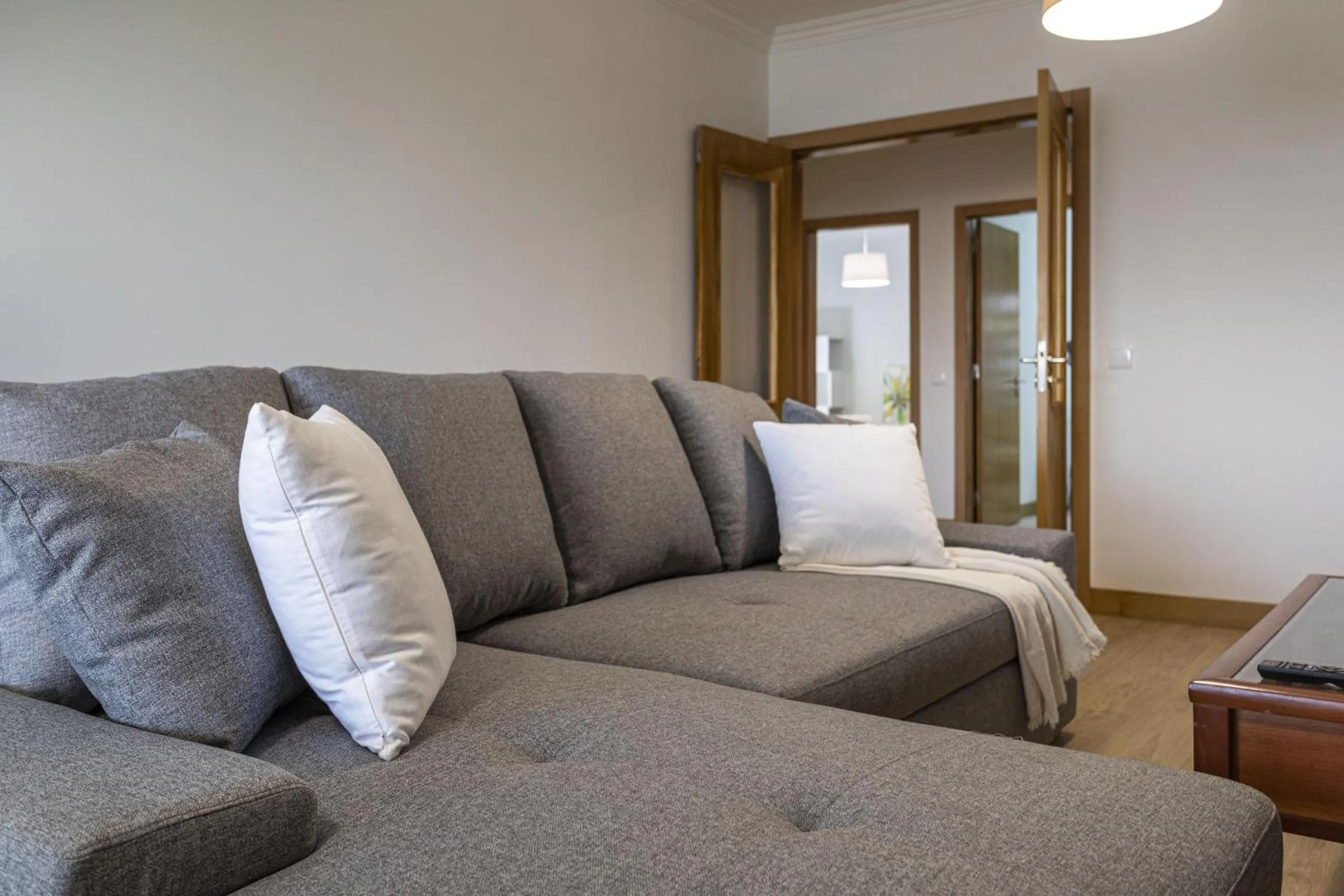 Communal lounge/ TV room, Bed in Miral 2 - Beach front apartment with pool