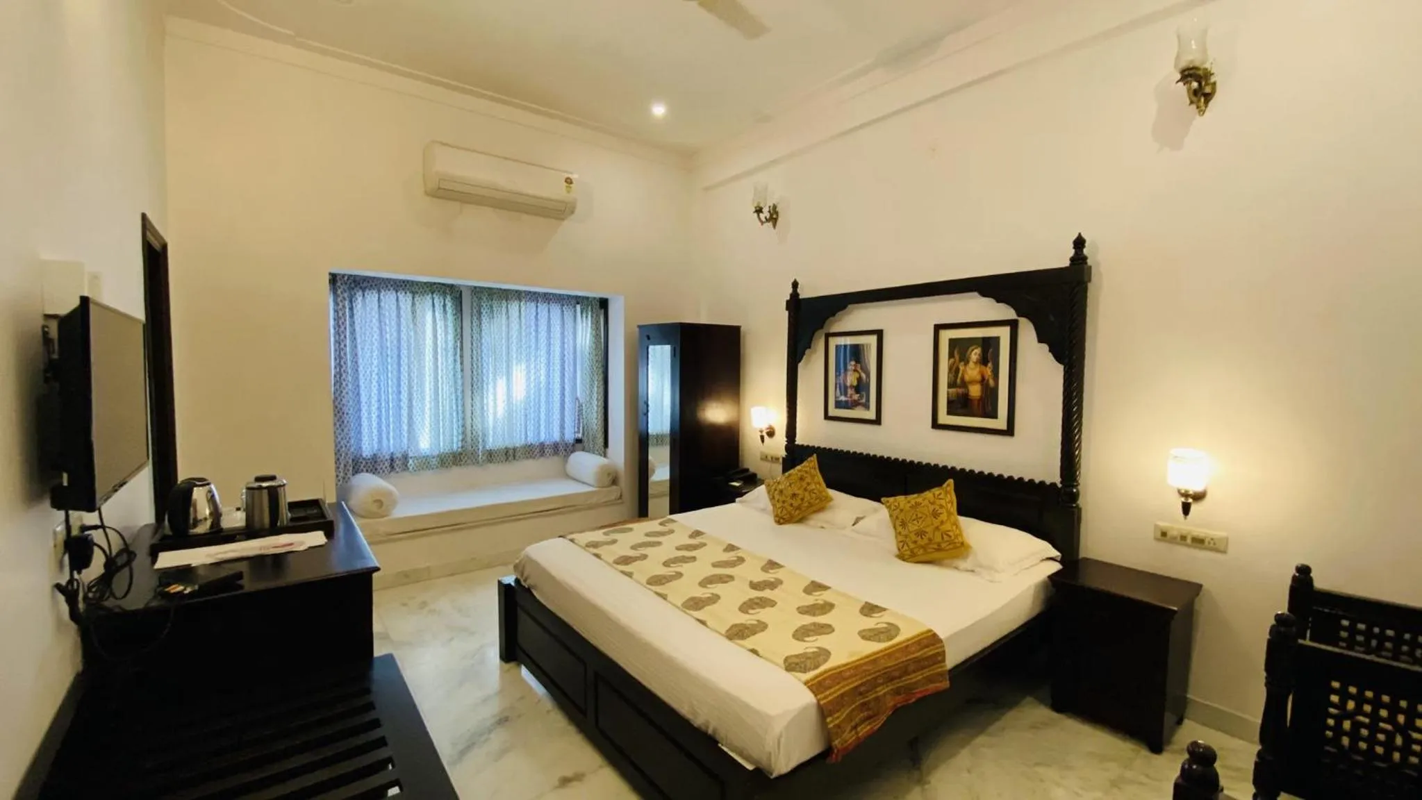 Seating area, Bed in Kotra Haveli A Boutique Hotel by Lake Pichola