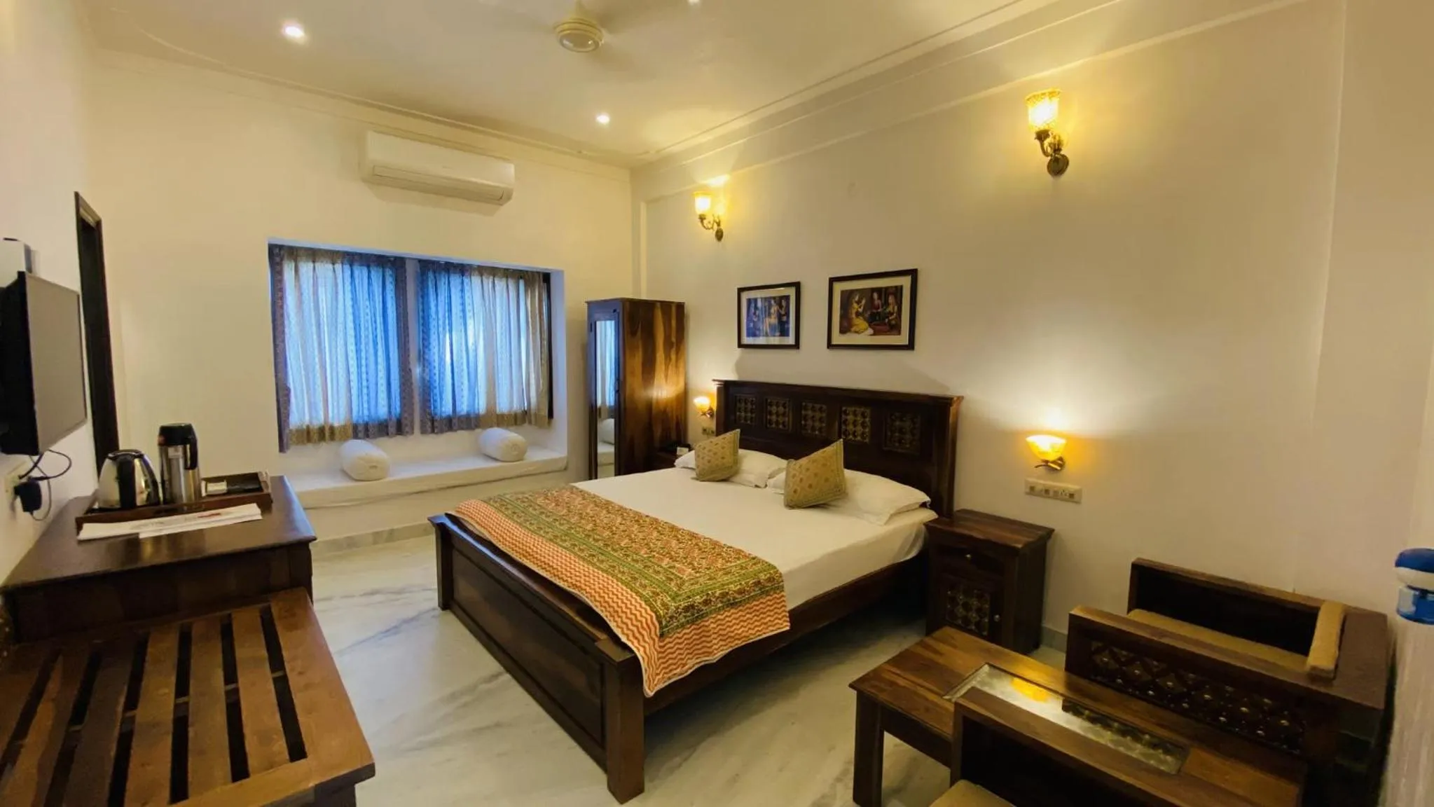 Seating area, Bed in Kotra Haveli A Boutique Hotel by Lake Pichola