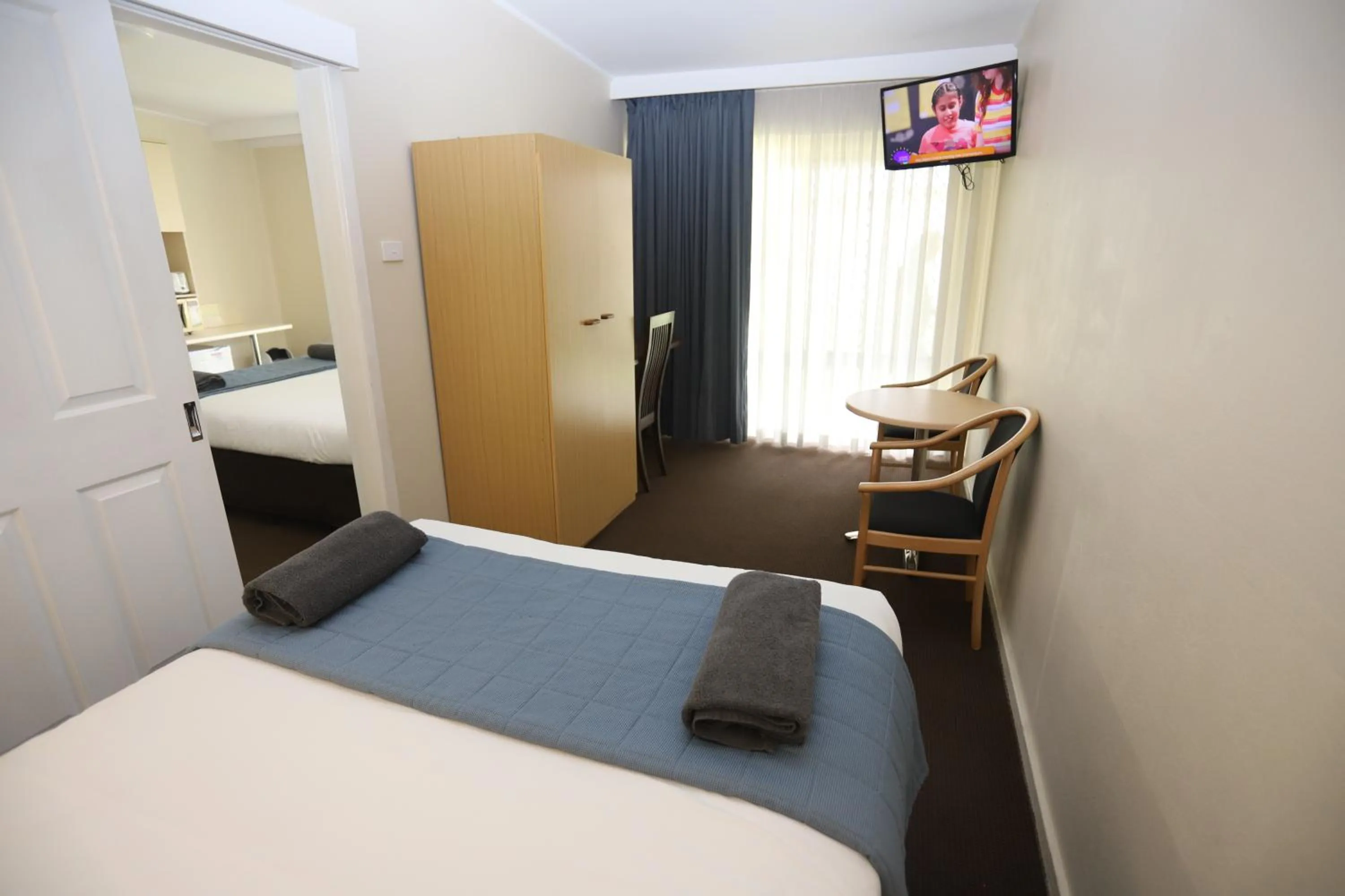 Bed in Sleepy Hill Motor Inn