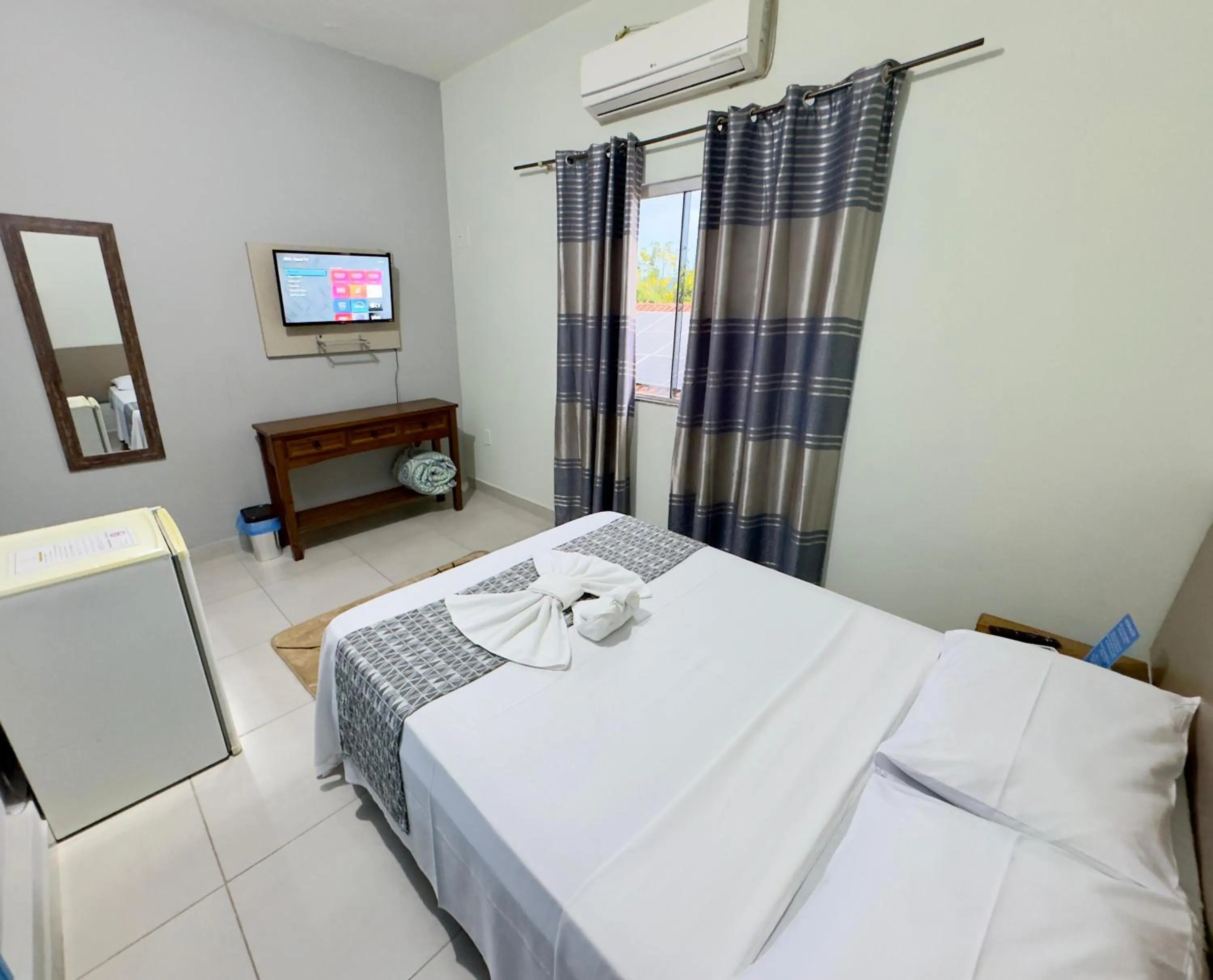 Bedroom, Bed in Pousada Cambará Suítes